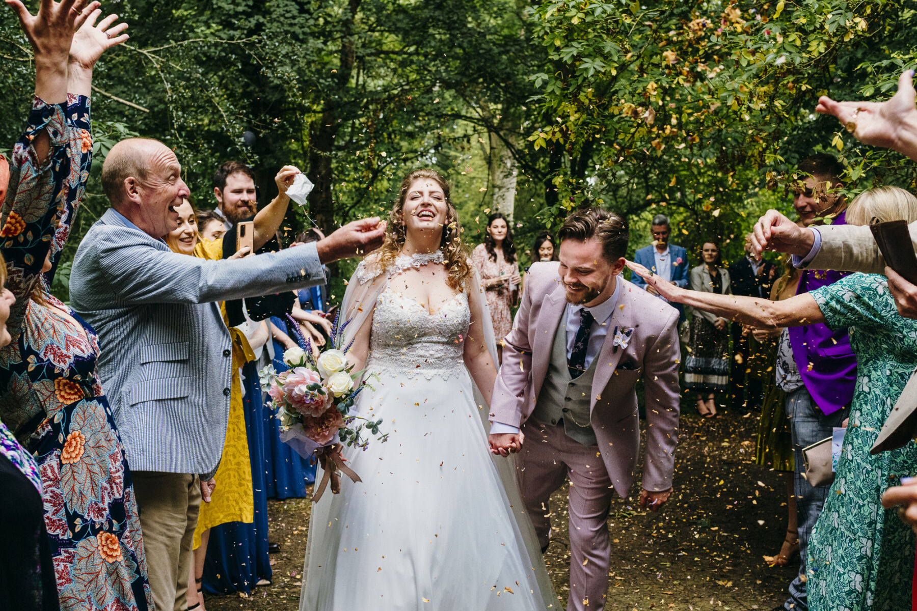 Confetti shot, woodland wedding. Sandra Reddin Photography: London wedding photographer