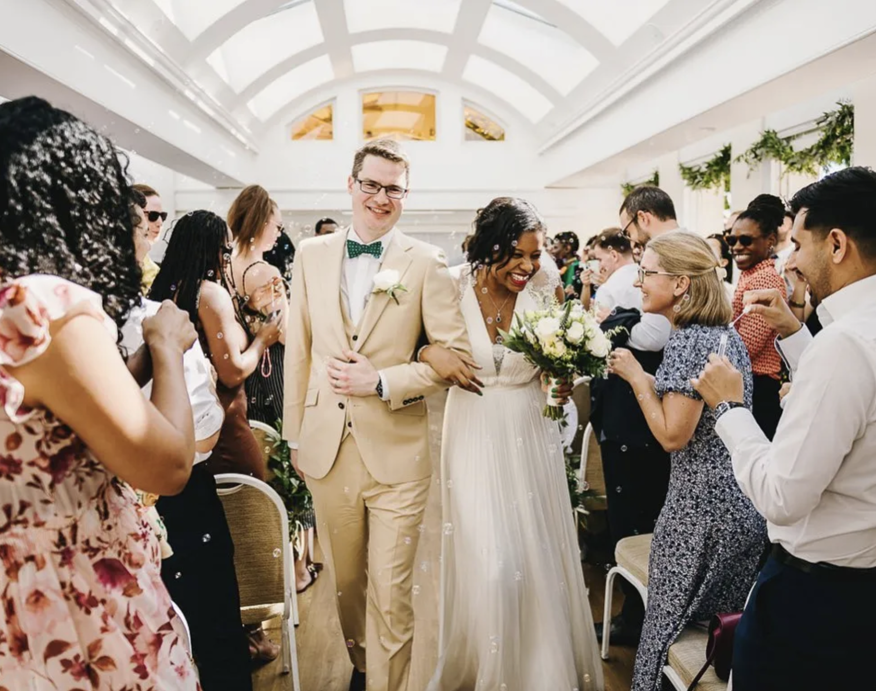 Mixed race couple at wedding. Sandra Reddin Photography: London wedding photographer.