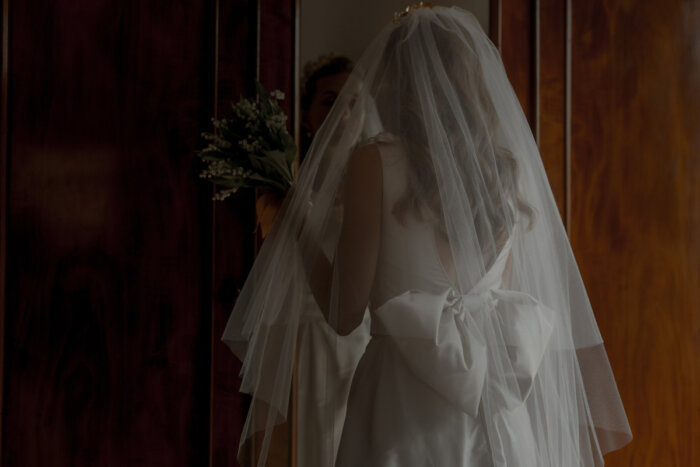Emily wedding dress with big bow.