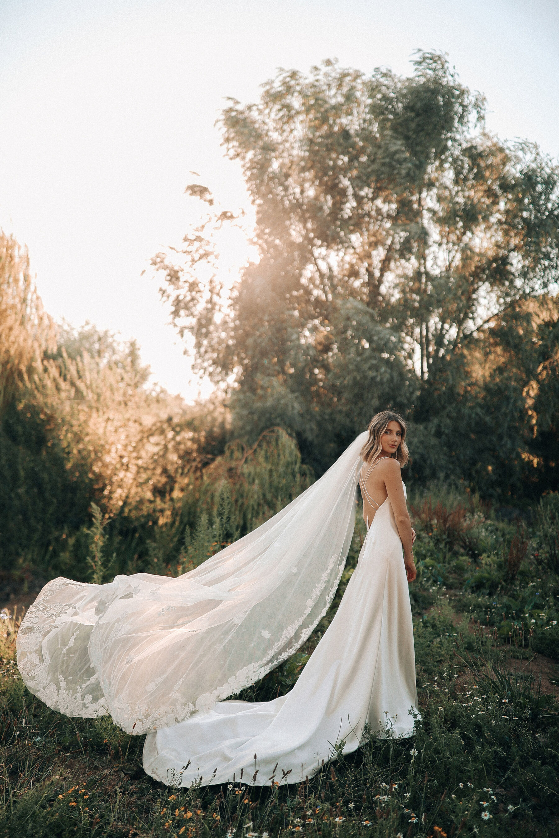 https://www.lovemydress.net/wp-content/uploads/2022/10/18-Megan-Gilbrides-wedding-Andrea-Hawkes-dress-copy.jpg