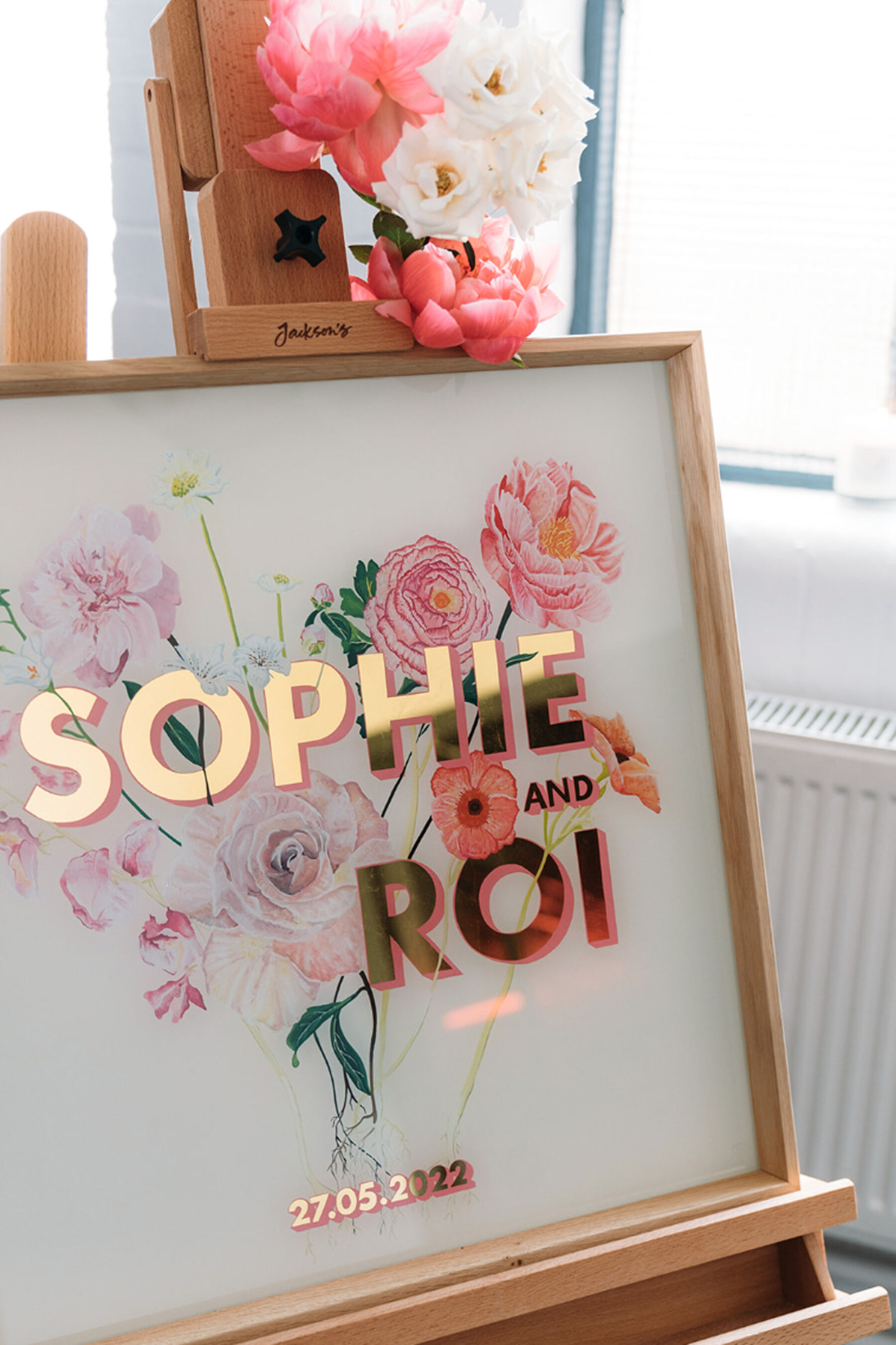 Professional wedding signs + signage in gold lettering with floral illustrations.