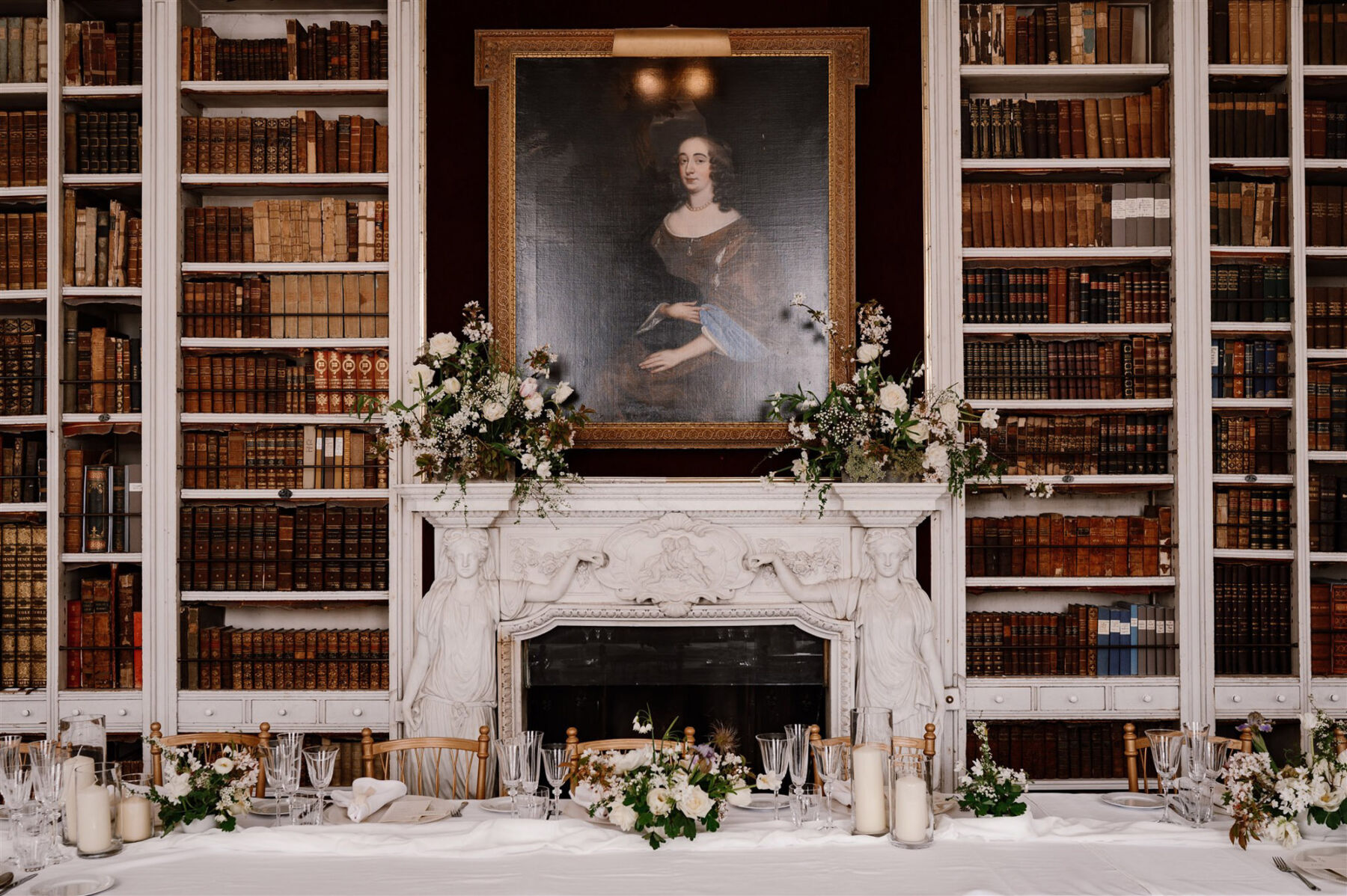 Floral fireplace wedding decor by Vervain Flowers, at St Giles House wedding venue, Dorset