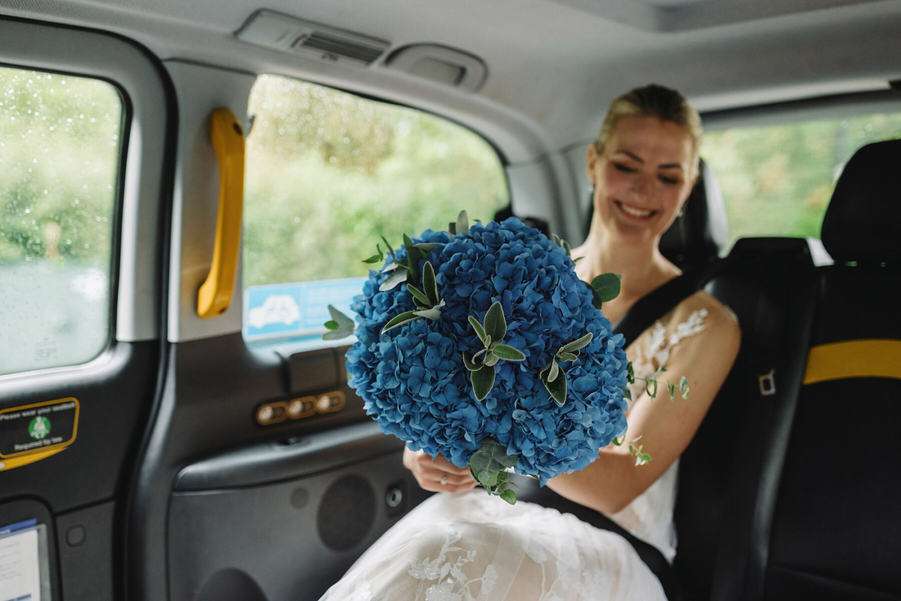 Large blue hydrangea wedding bouquet. Wolf & Co. Photography.