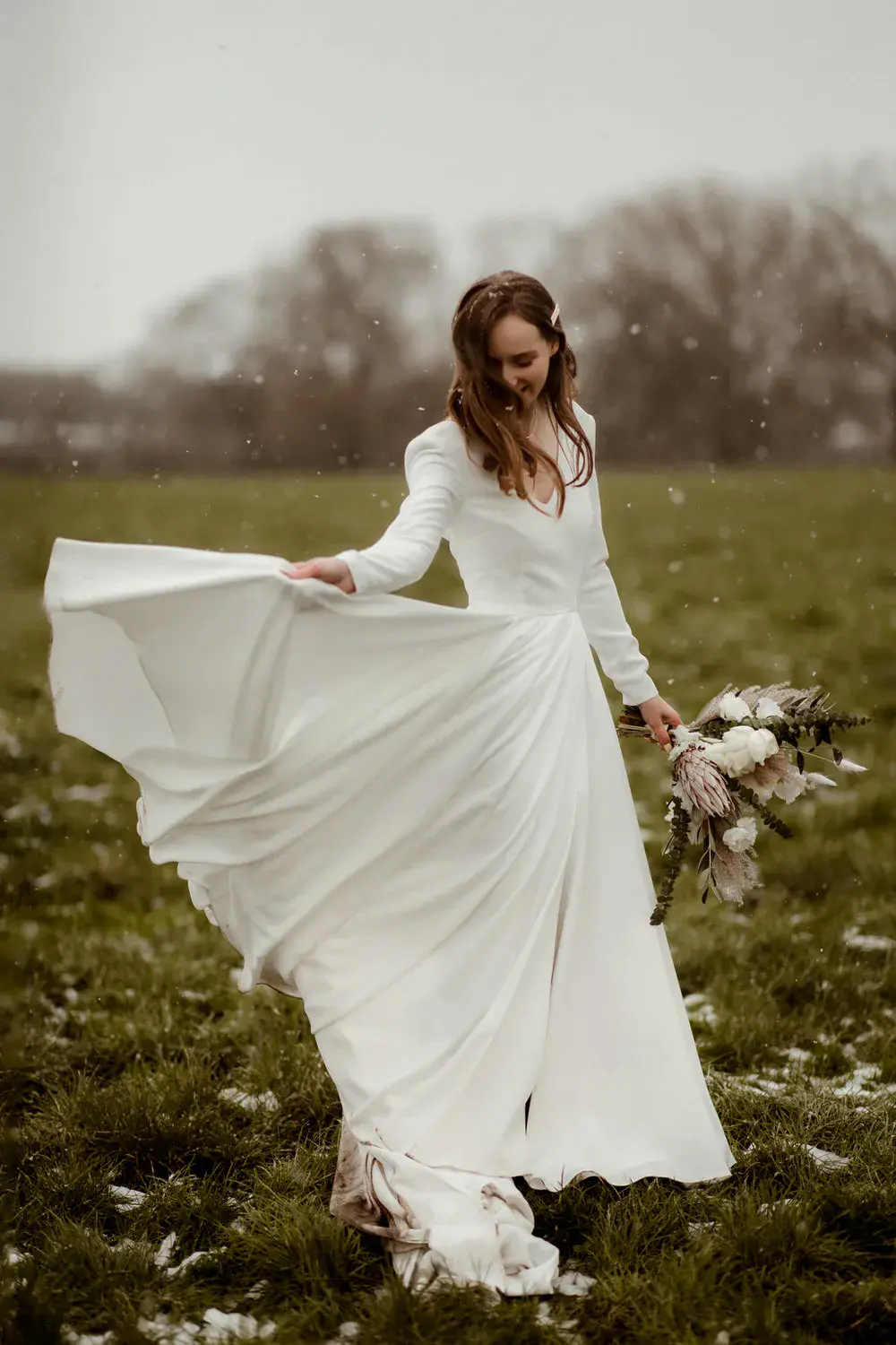 Long sleeved simple wedding dress by Rita Colson