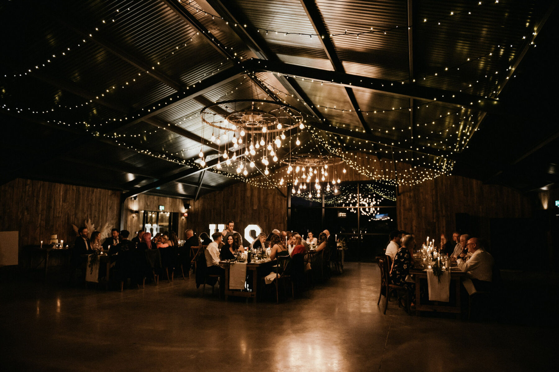 Silchester Farm barn wedding venue with hanging fairy lights. Jessica Grace Photography.