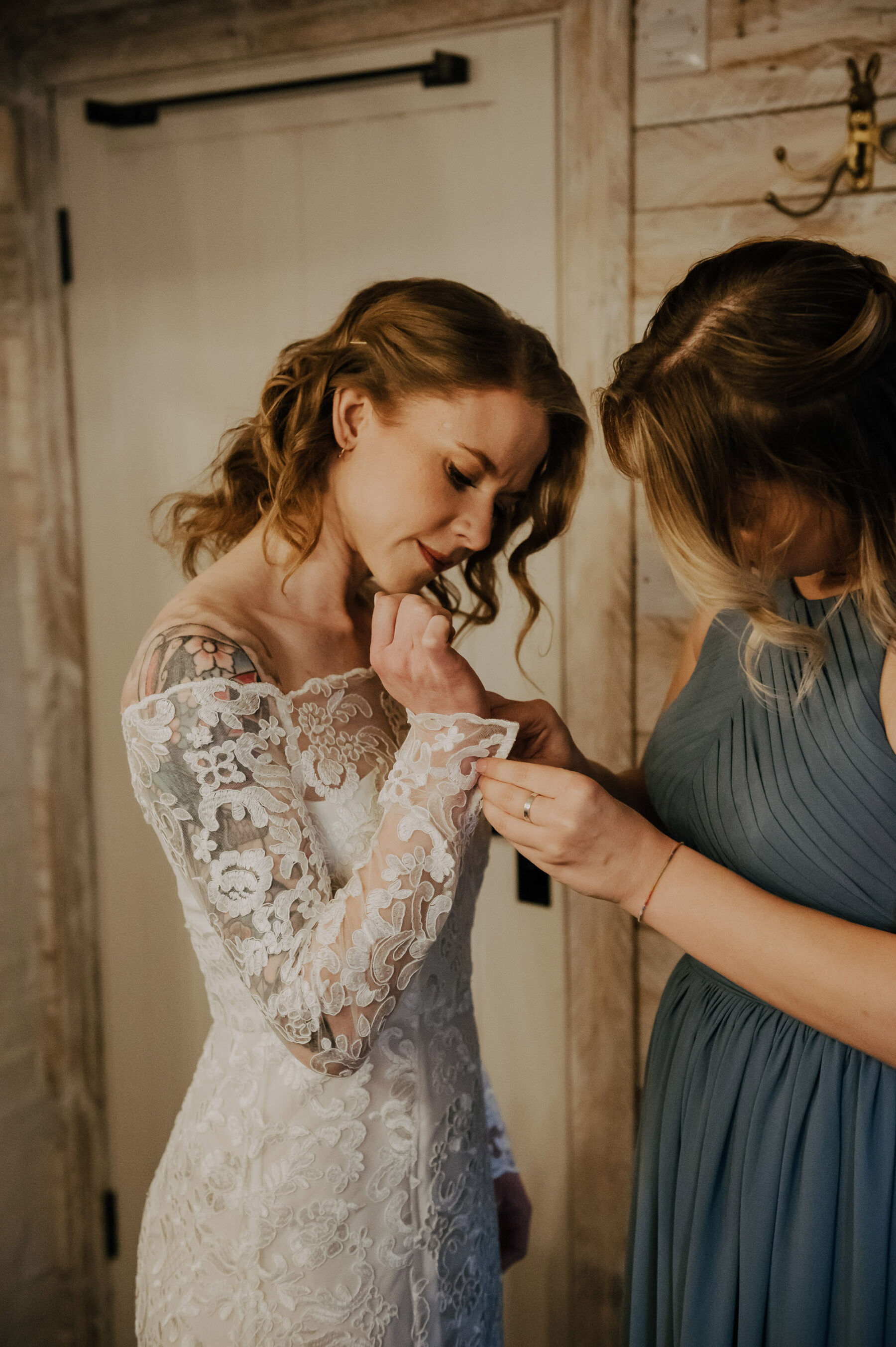 Bride with tattooed arm in Whistles wedding dress. Jessica Grace Photography.