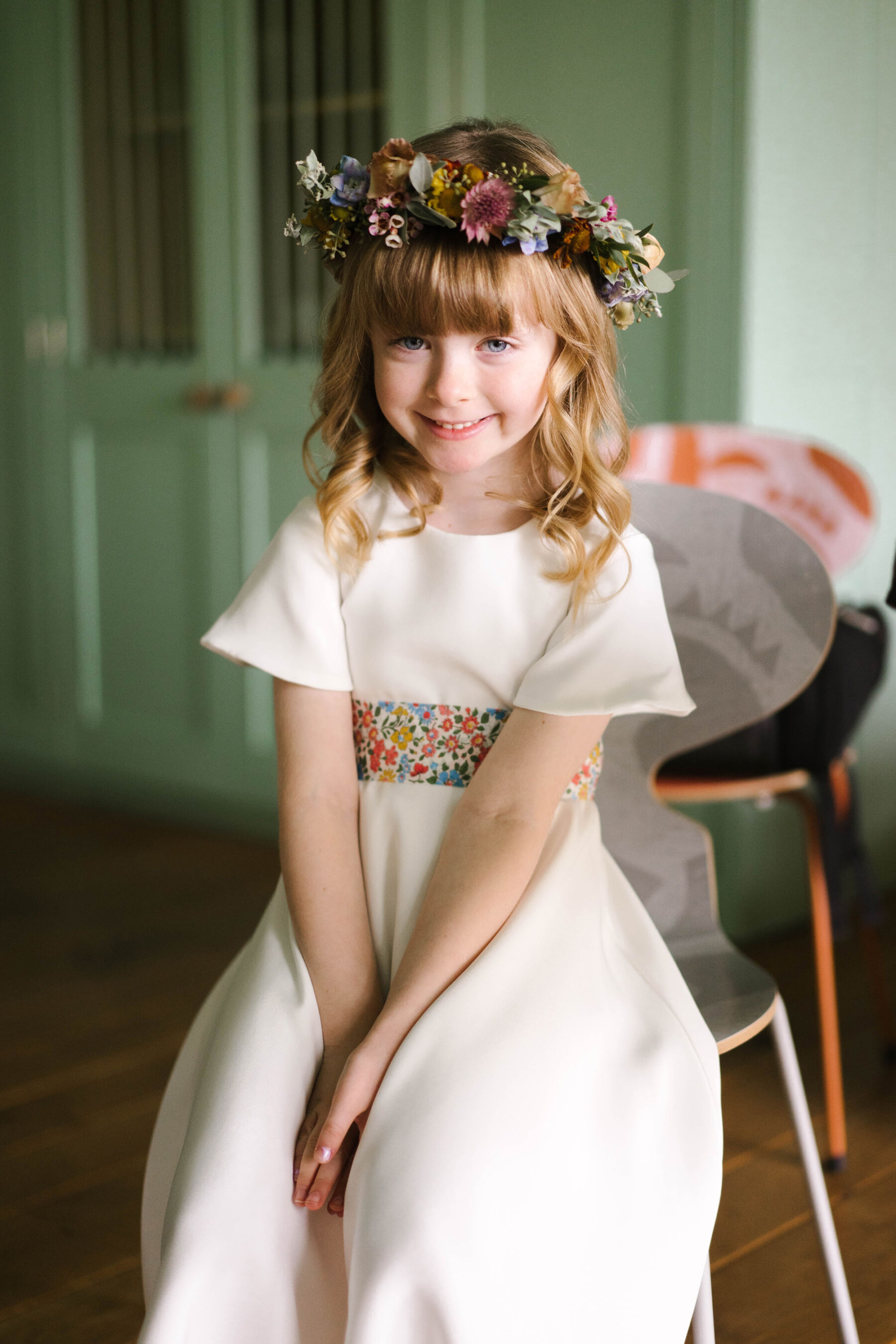 Flowergirl in ethical silk dress by Andrea Hawkes with floral band + floral crown.