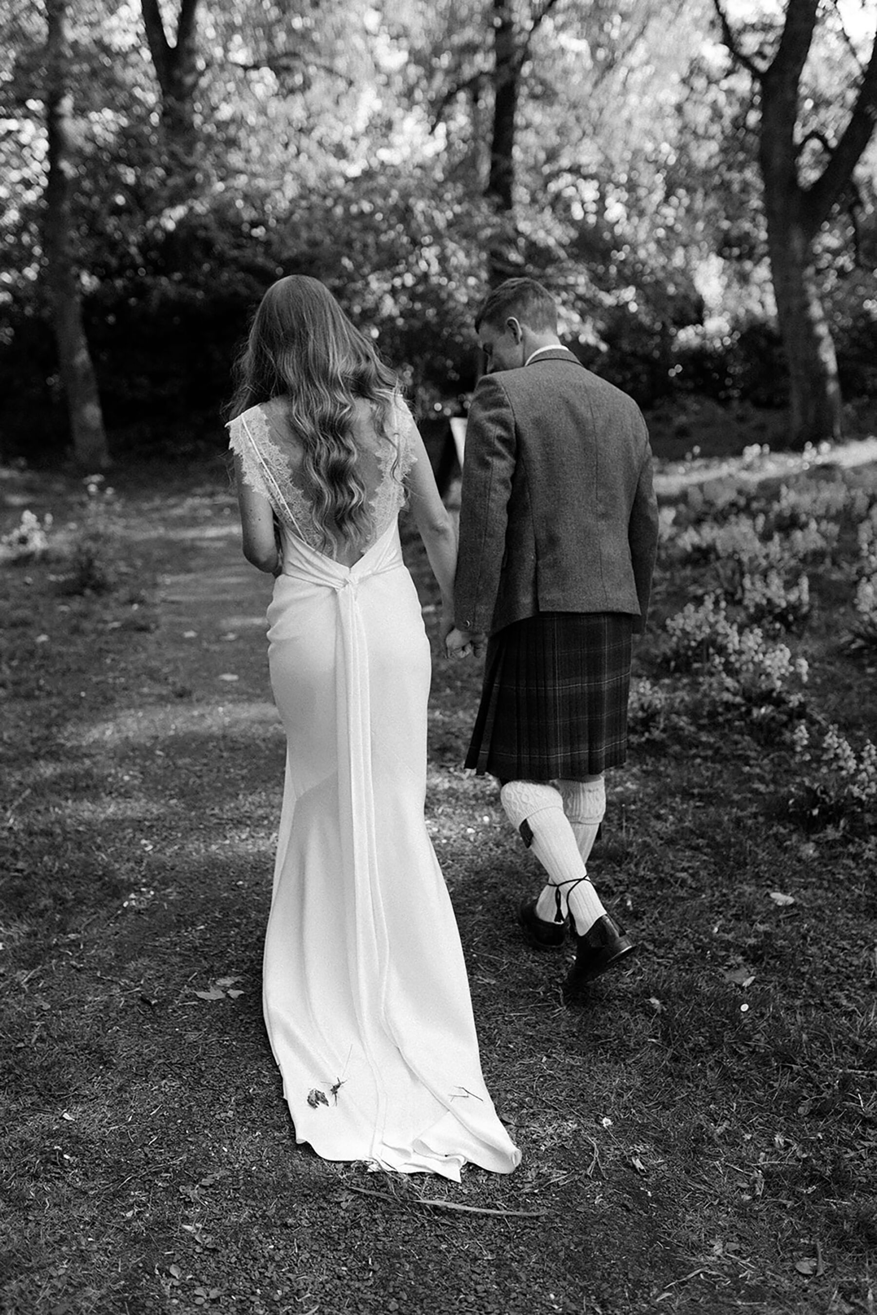 Backless Savannah Miller wedding dress.