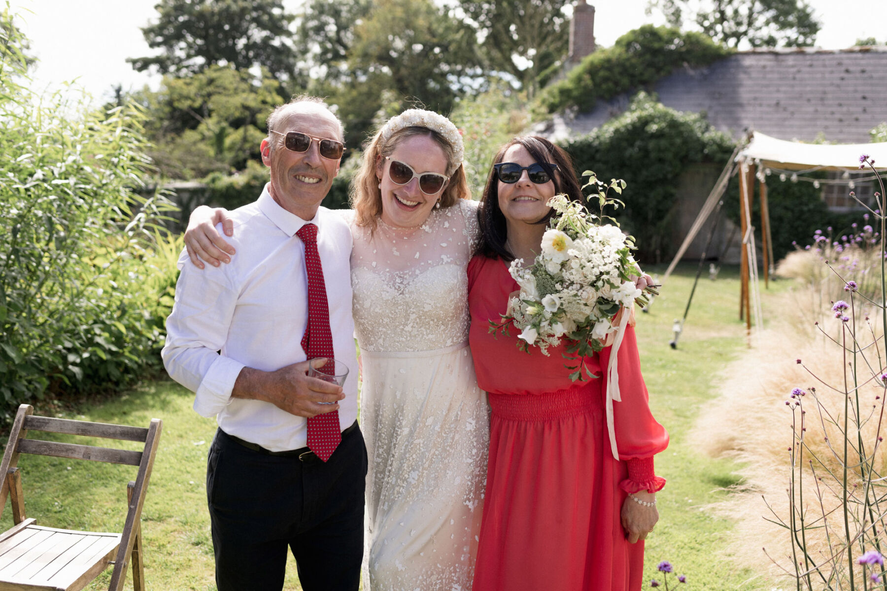 Happy bride in sunglasses & Jesus Peiro wedding dress. Lyra & Moth Photography.