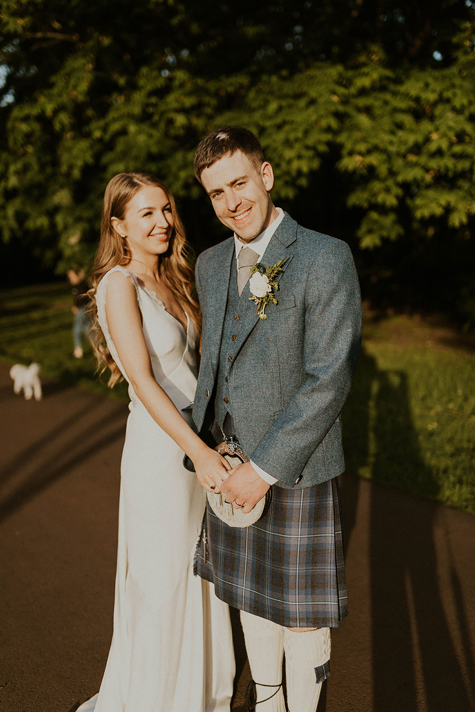 Scottish bride & groom. Bride wears Savannah Miller wedding dress. Groom in kilt.