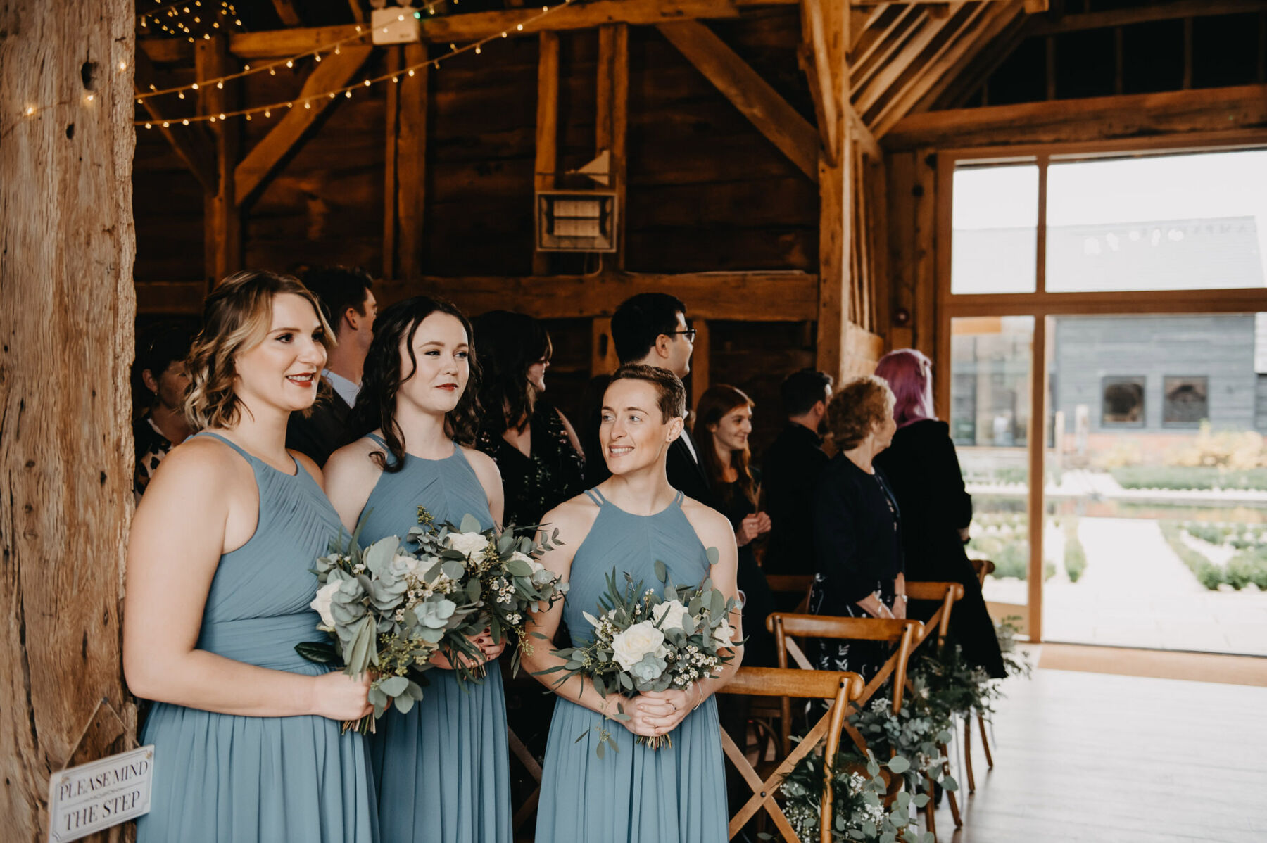 Bridesmaids in pale blue green dresses. Jessica Grace Photography.