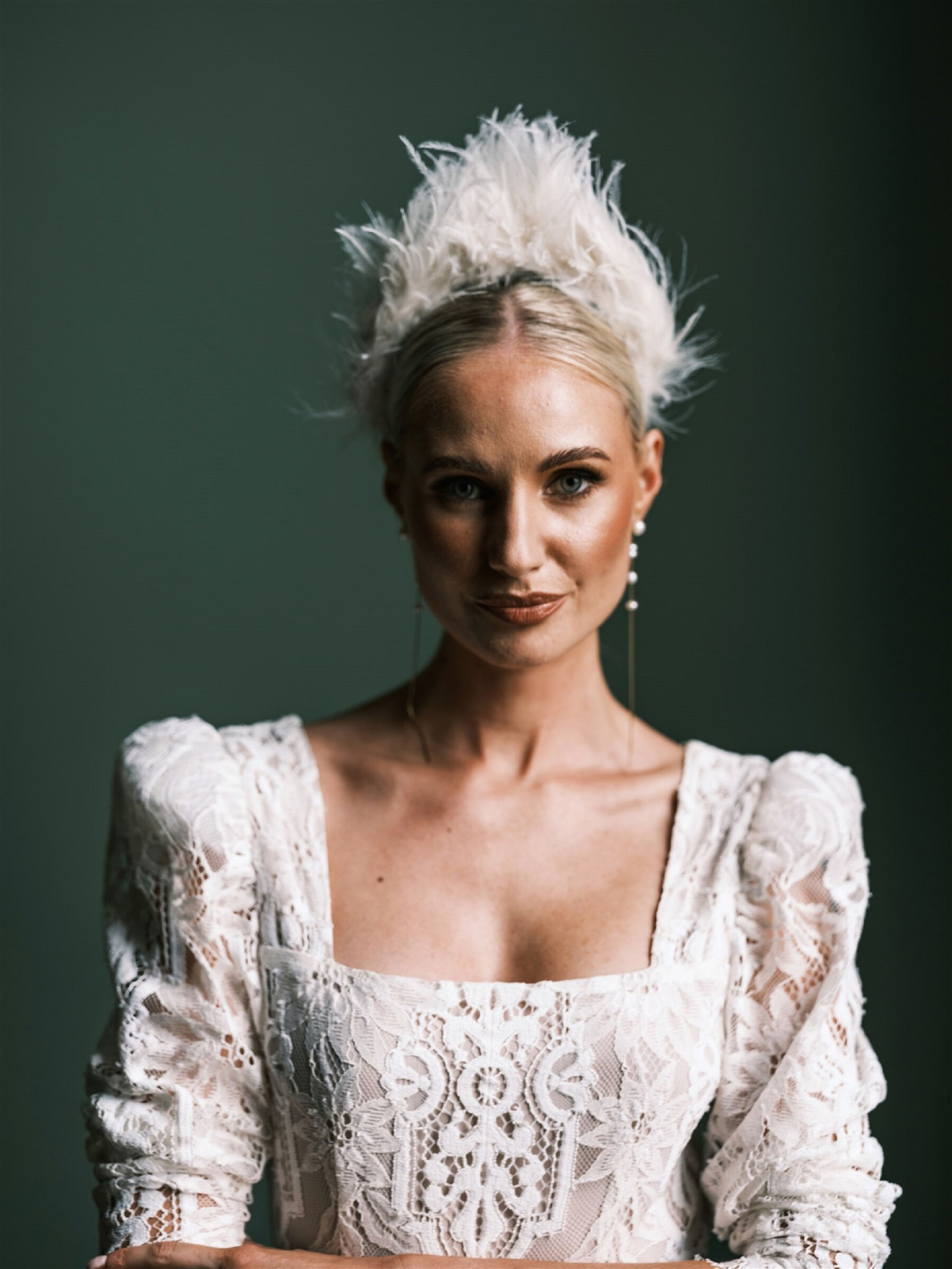 Ostrich feather bridal headpiece by Caragh Quinn of Aura Bridalwear. Katya Katya London wedding dress.