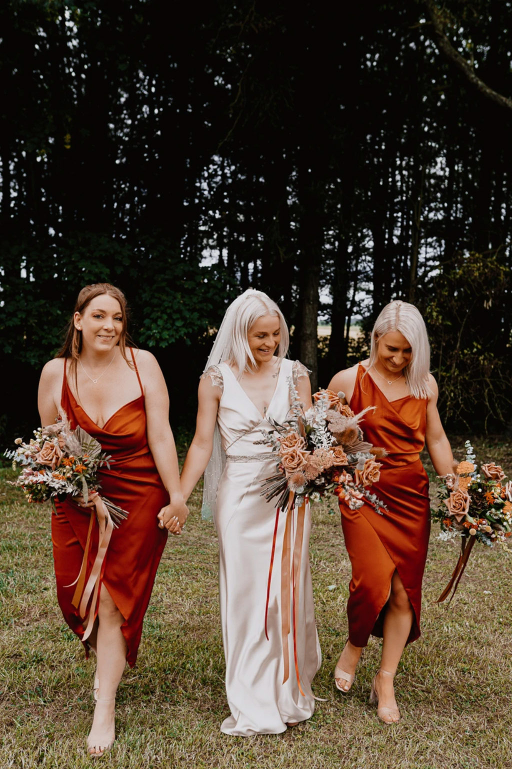 Bridesmaids in burnt orange dresses - Gabriela's Photography and Film, Sheffield South Yorkshire wedding photographer and videographer