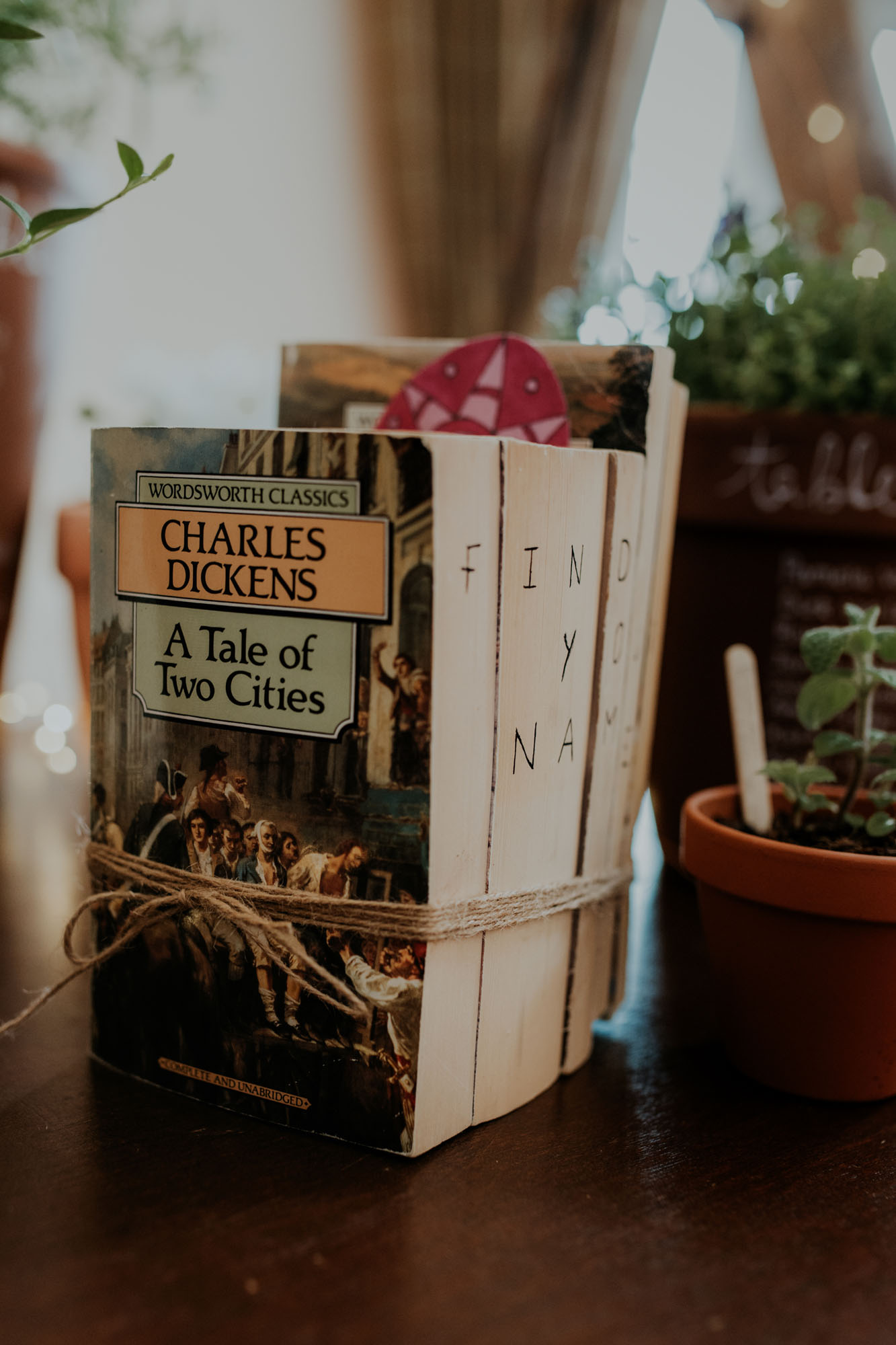 Books tied with twine - wedding decor