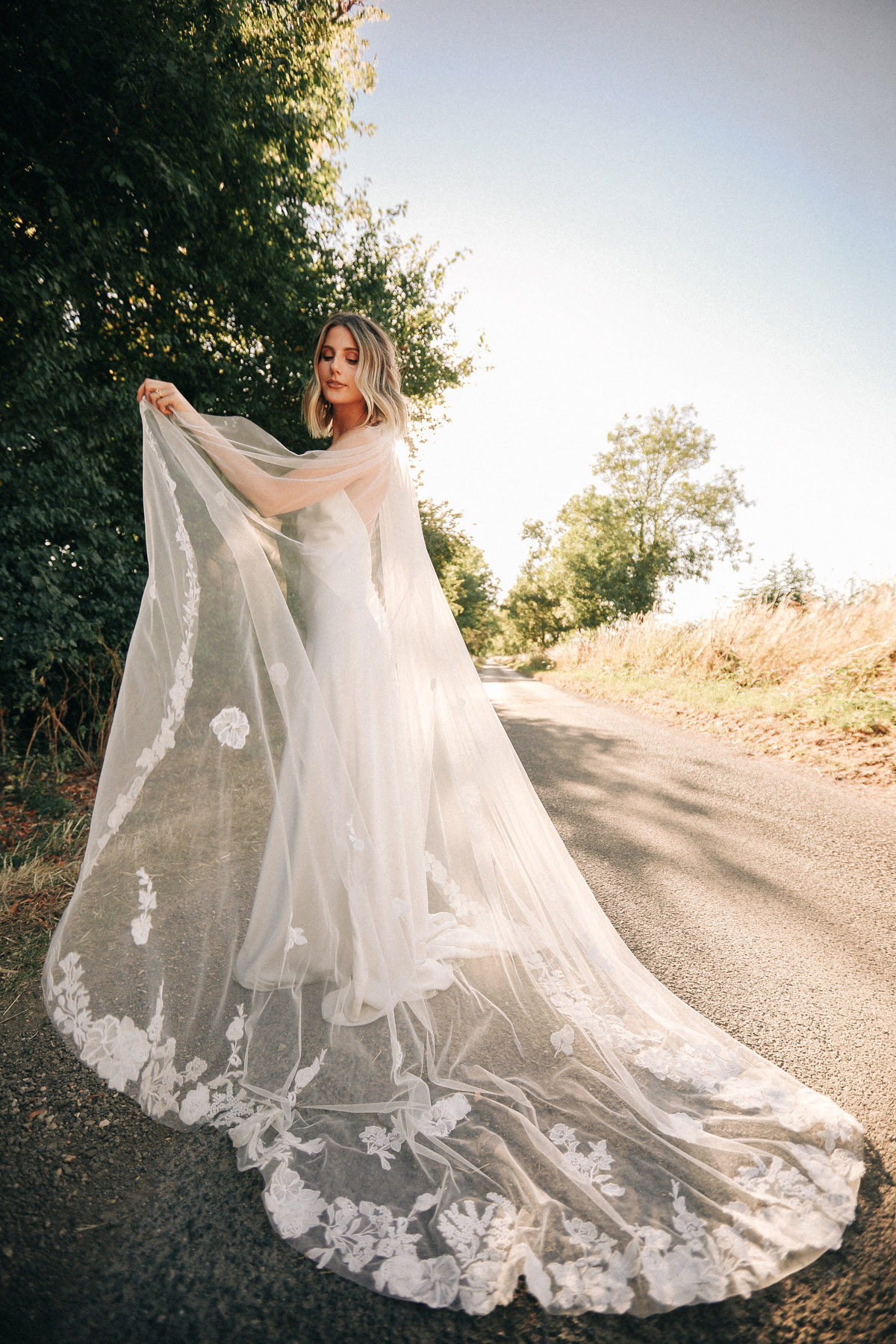 Megan Gilbride wearing Andrea Hawkes Bridal sustainable wedding dress & veil