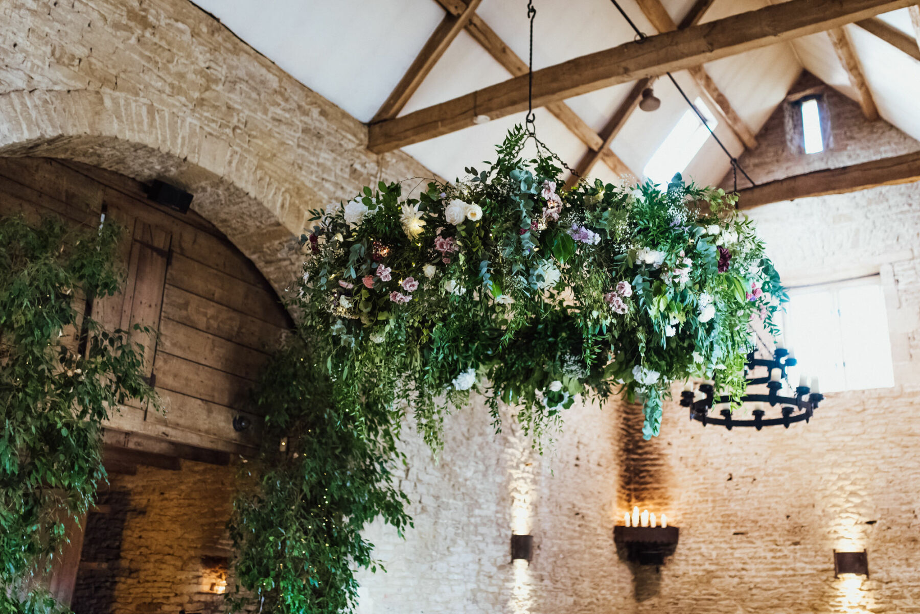 Hanging flowers at Stone Barn, Cotswolds wedding venue