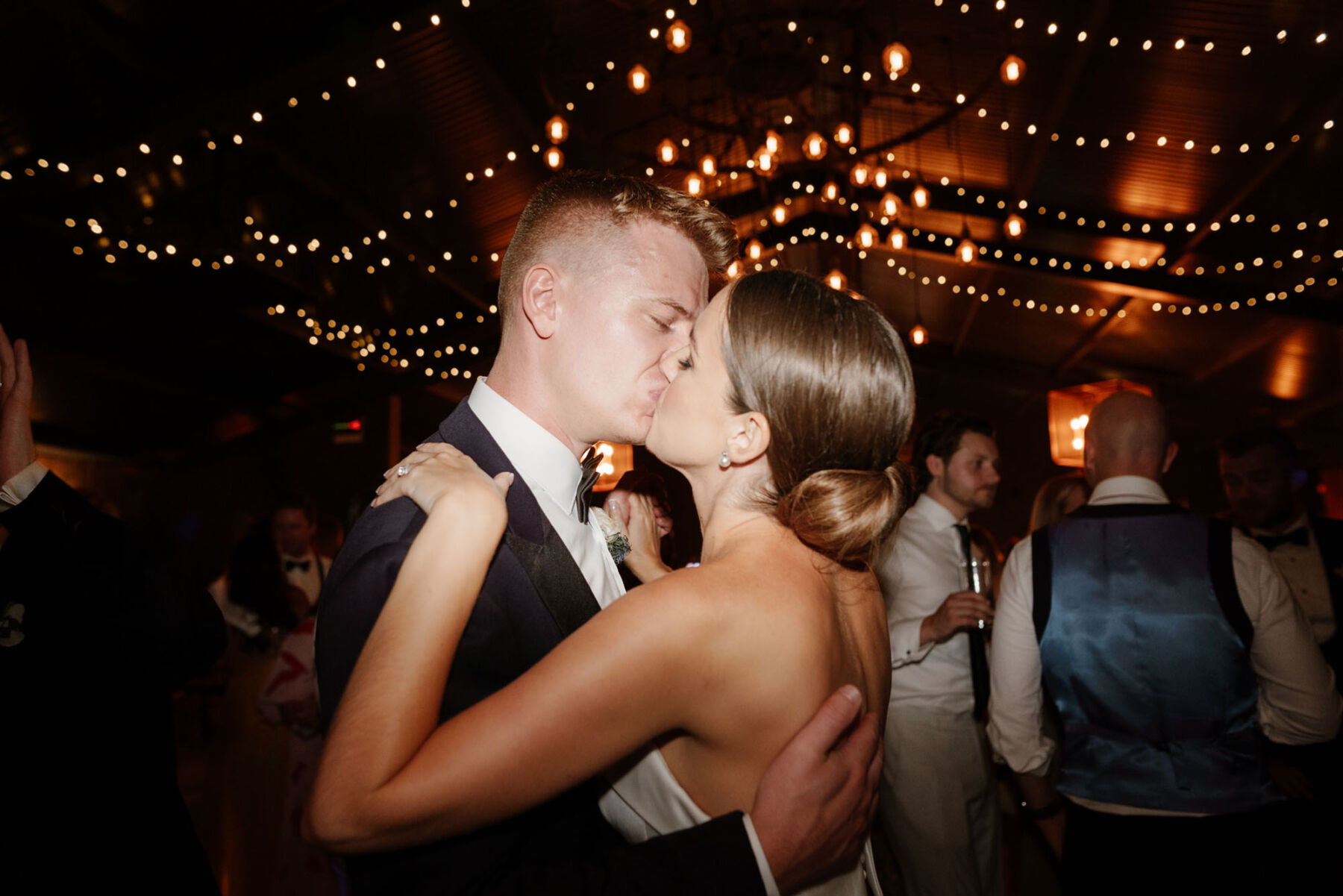 Bride & groom kissing on the dance floor
