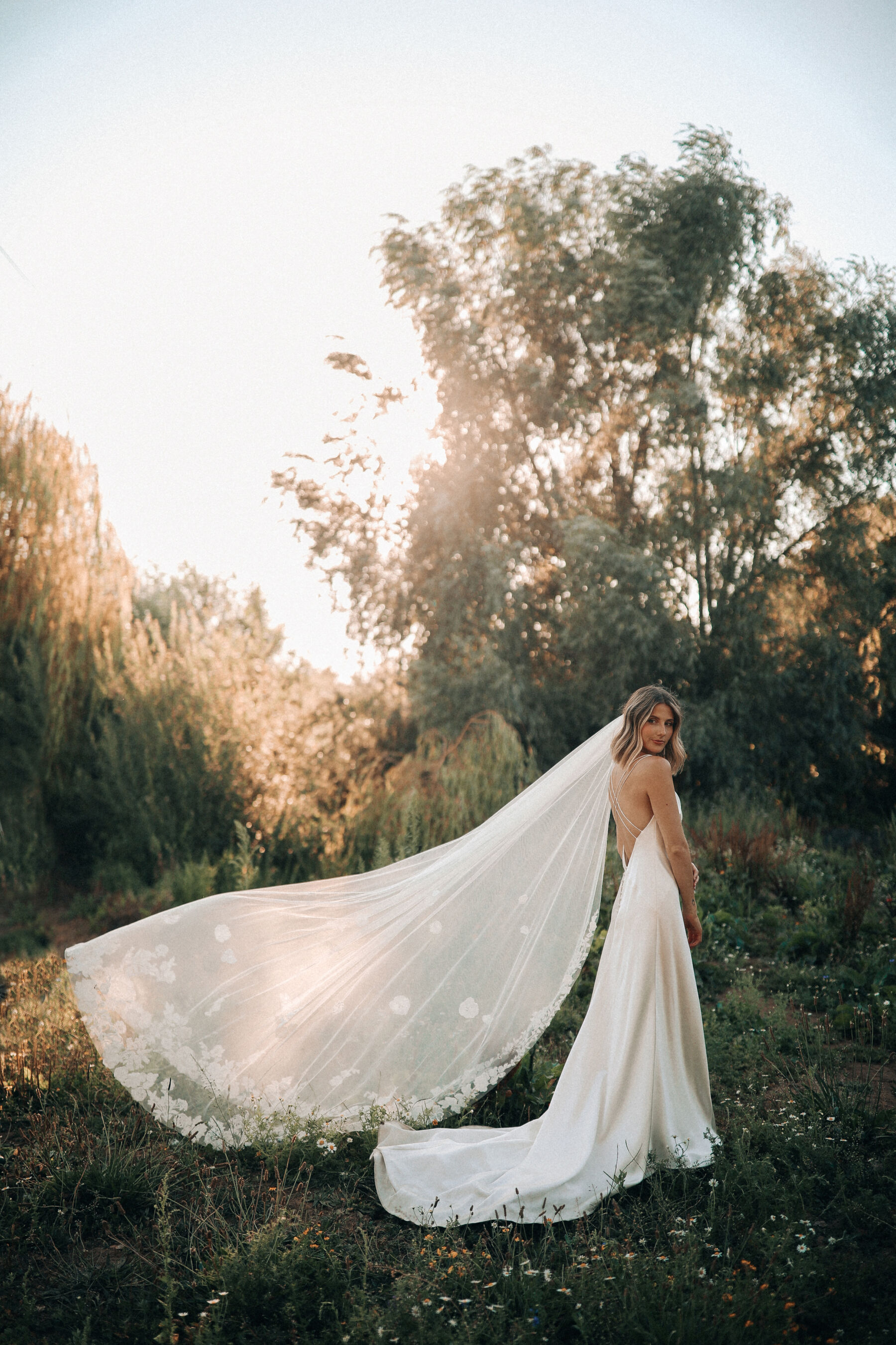 Megan Gilbride wearing Andrea Hawkes Bridal sustainable wedding dress