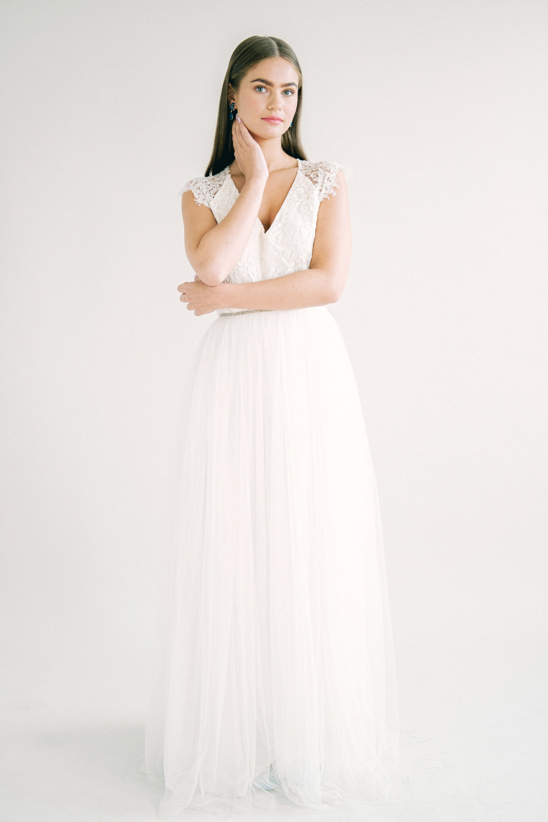 Kate Beaumont ethical wedding dress with lace capped sleeves.