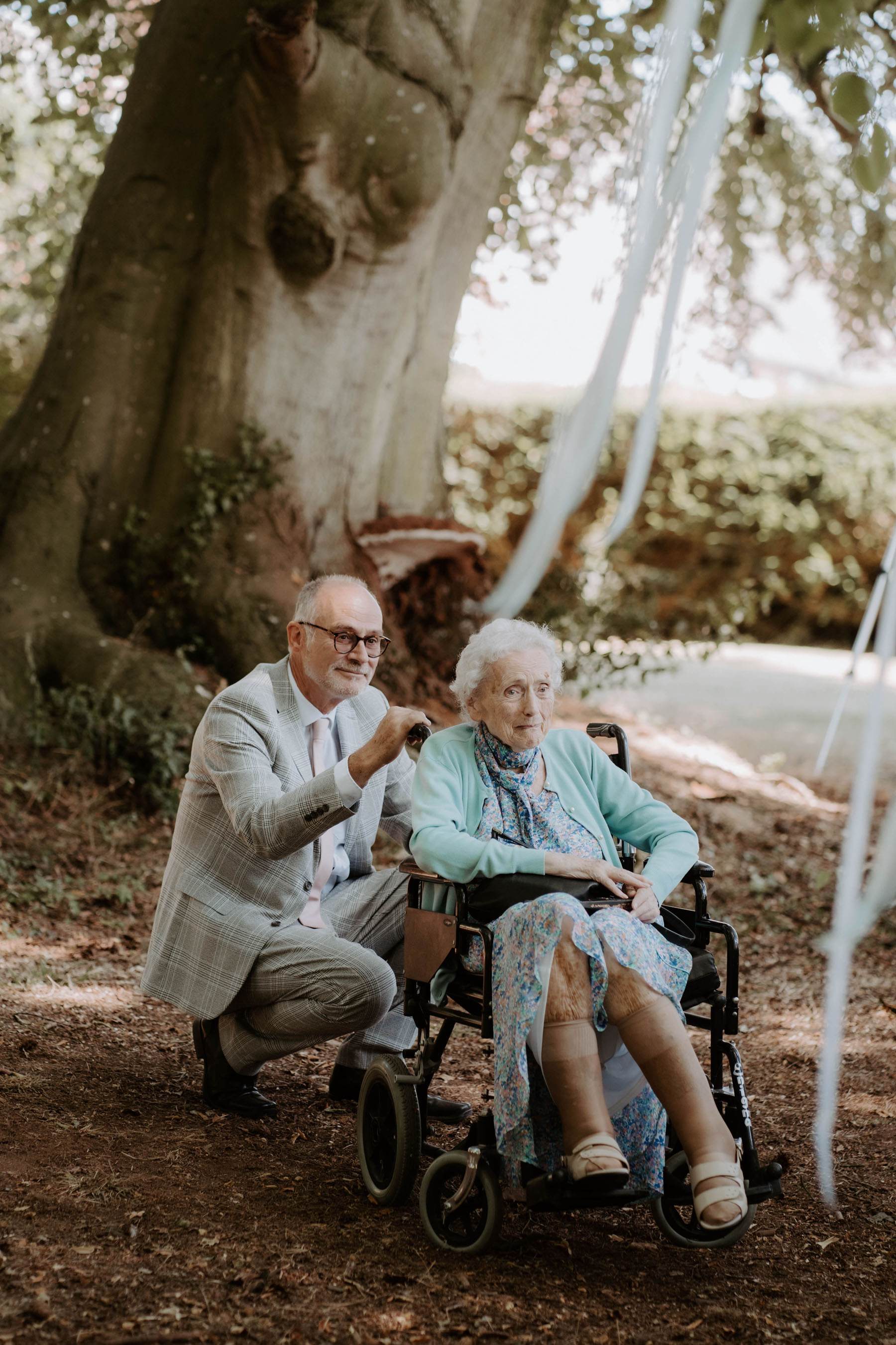 Elderly wedding guests, lady in a wheelchair at Broadfield, Herefordshire country house wedding venue
