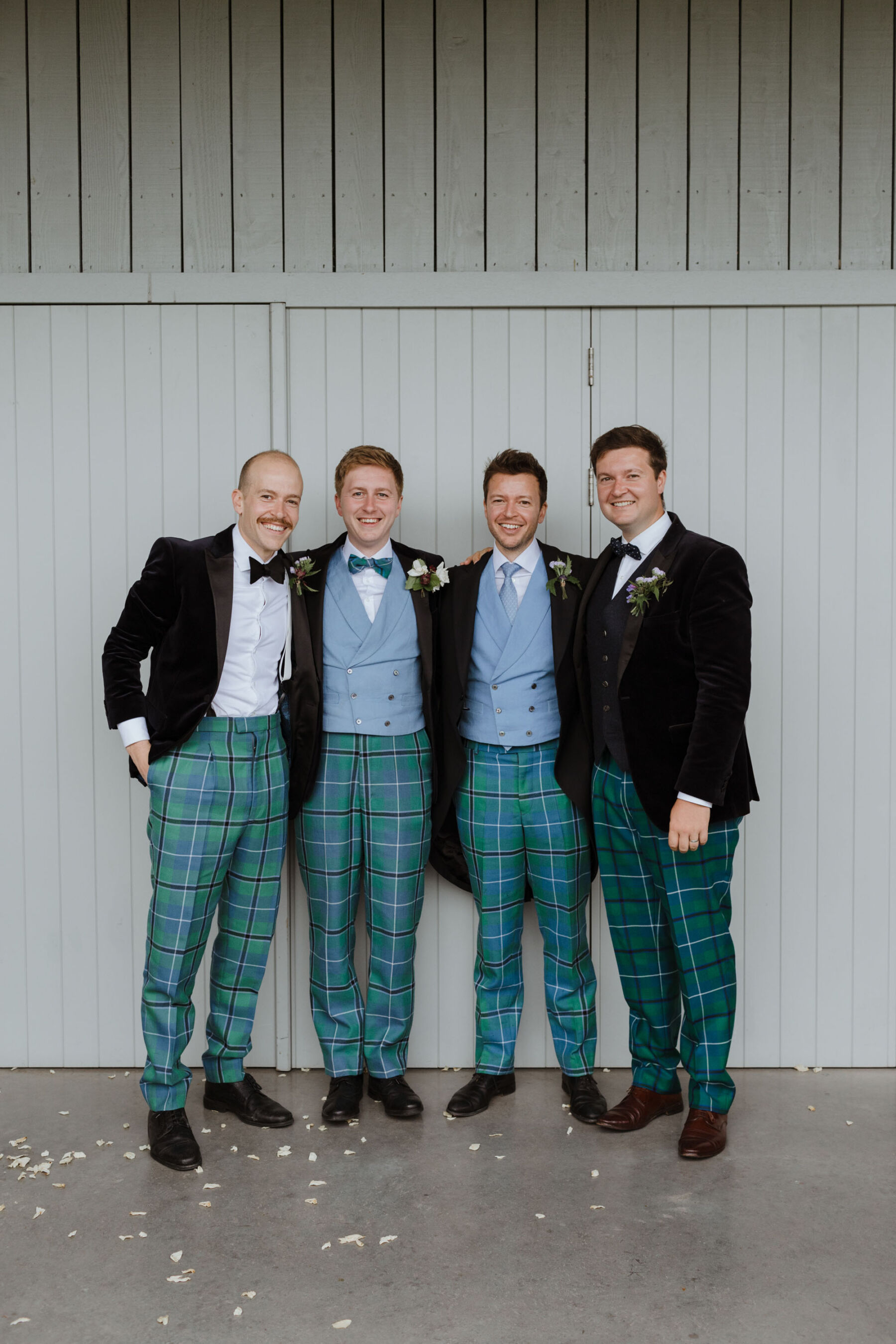 Groom & groomsmen in tartan trousers. Caro Weiss Photography.