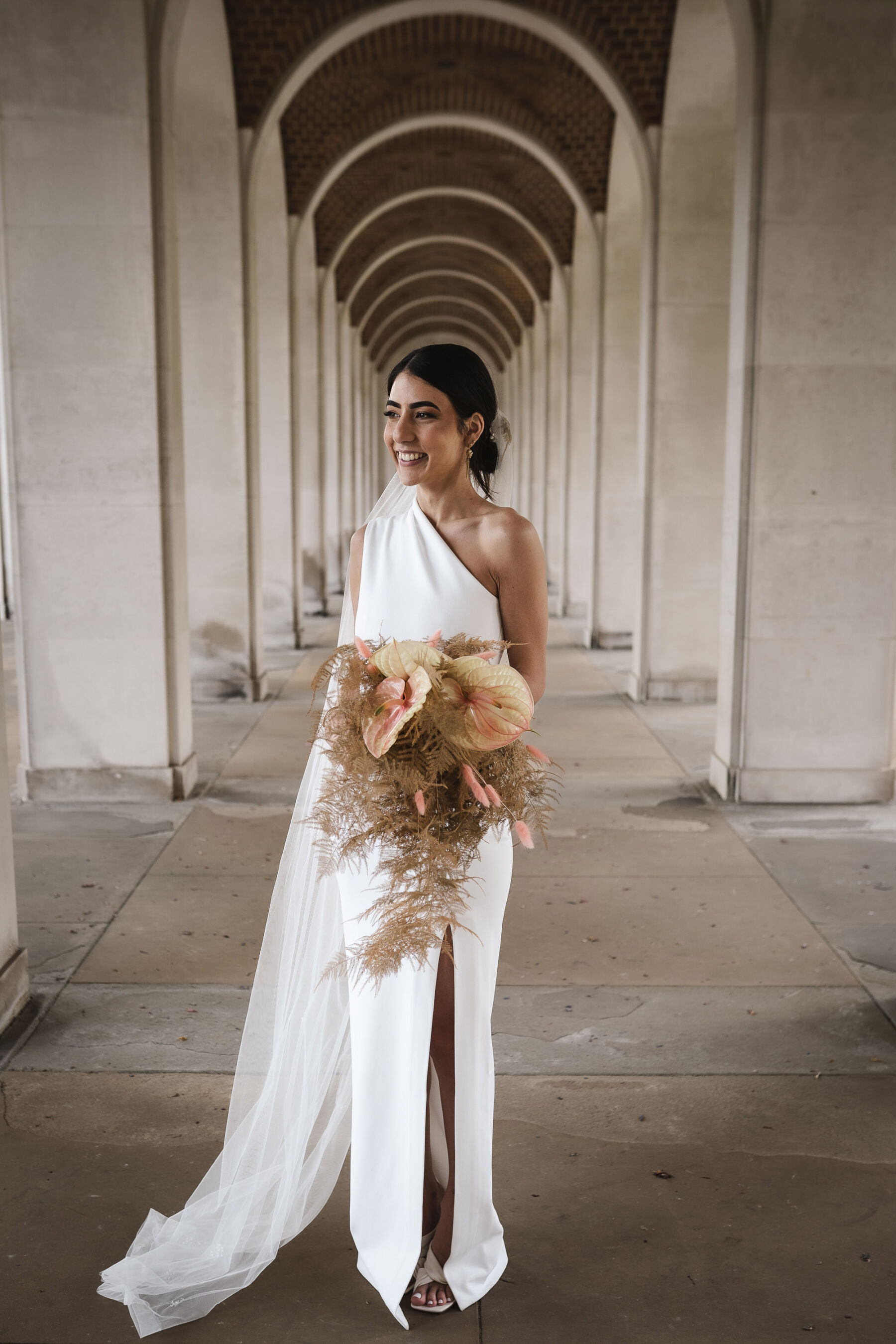 Solace London wedding dress. By Karolina Photography.