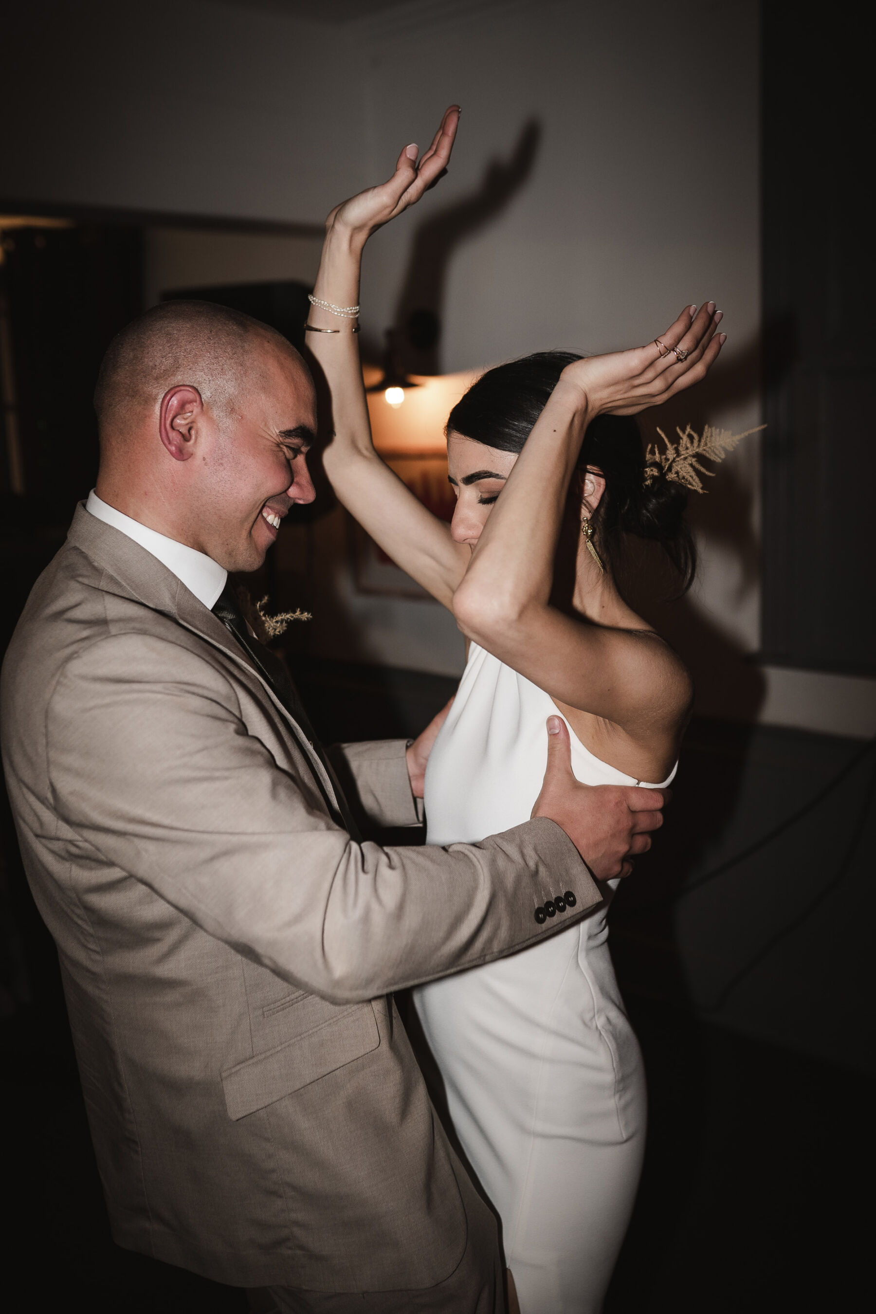 Very happy bride & groom on the dancefloor. By Karolina Photography.