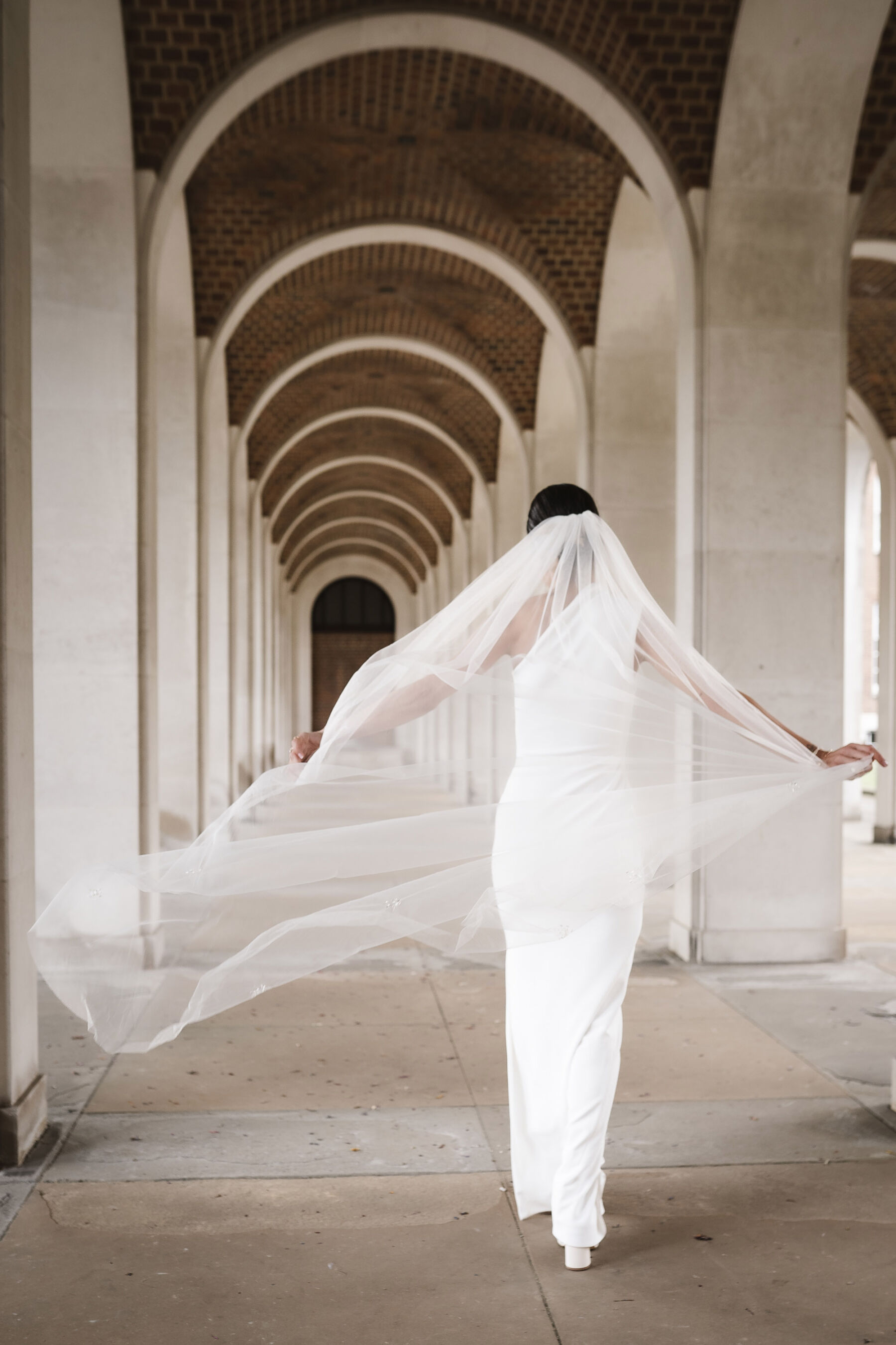 Veil captured in movement. By Karolina Photography.