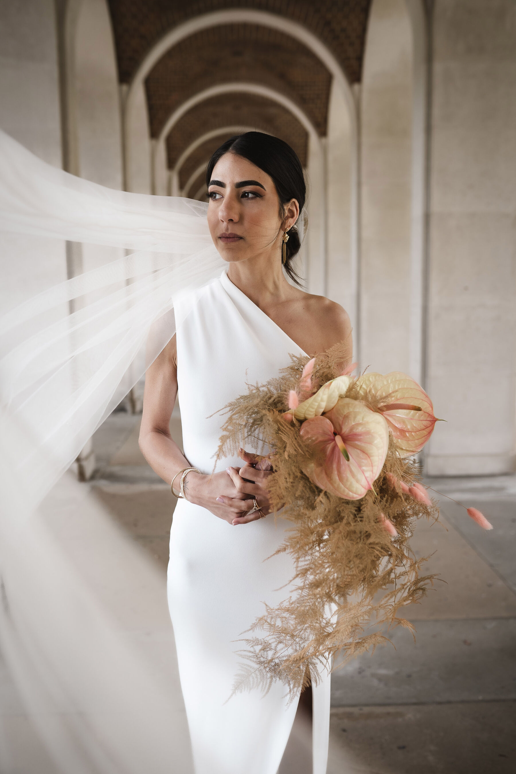 Solace London wedding dress. By Karolina Photography.