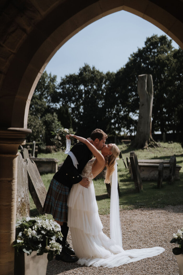 Kindling Bridal tiered tulle wedding dress. Middleton Lodge wedding. Georgina Harrison Photography.