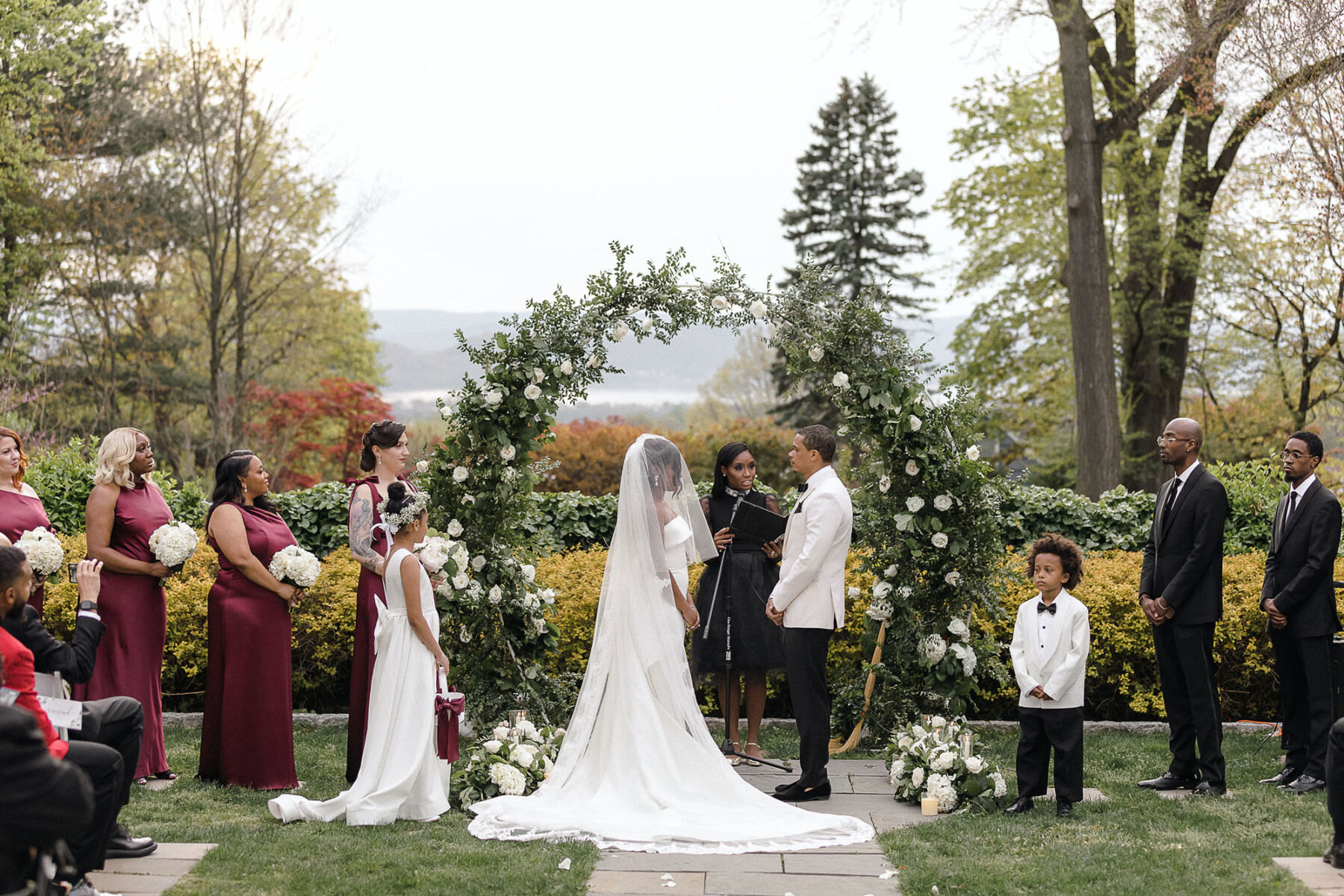 Floral arch, outdoor wedding ceremony, Eva Lendel bride