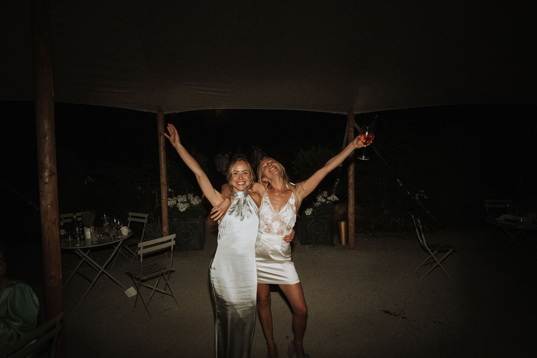 Bride about to hit the dance floor in a mini dress.