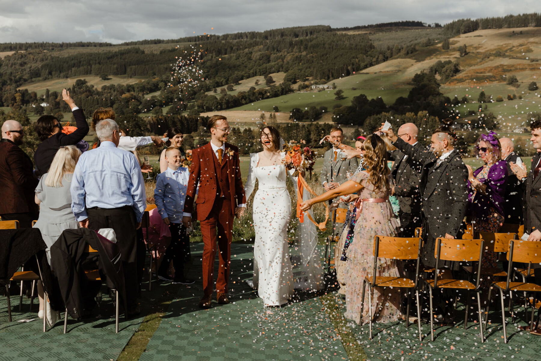 Ballintaggart Farm wedding. Confetti shot. Suzanne Neville Amber dress.