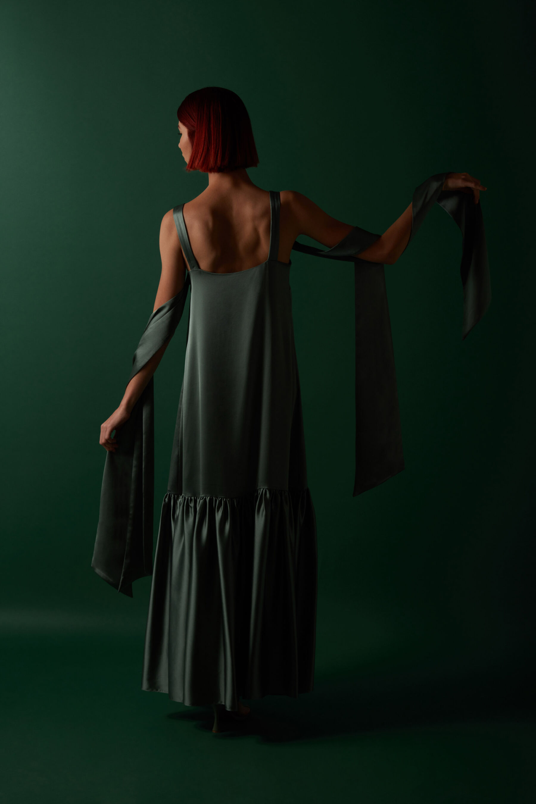 The Carrie sage green bridesmaids dress by Halfpenny London Sister.