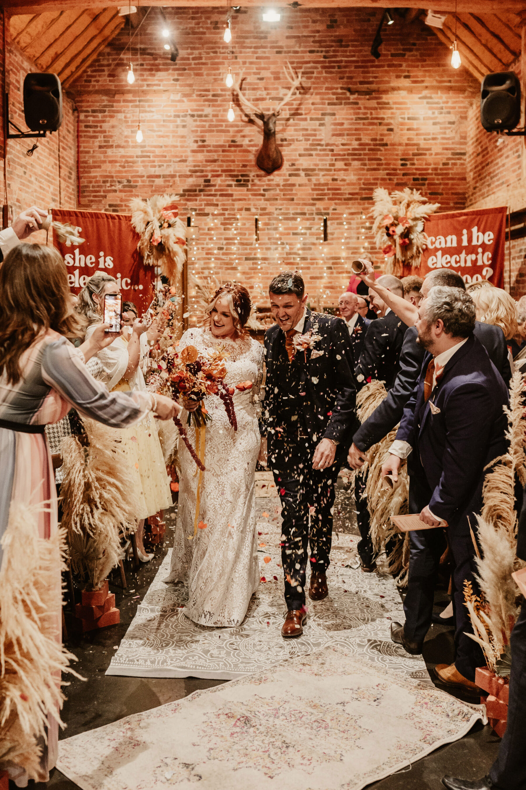 Confetti wedding ceremony exit, colourful, bohemian. Donington Park Farmhouse Wedding