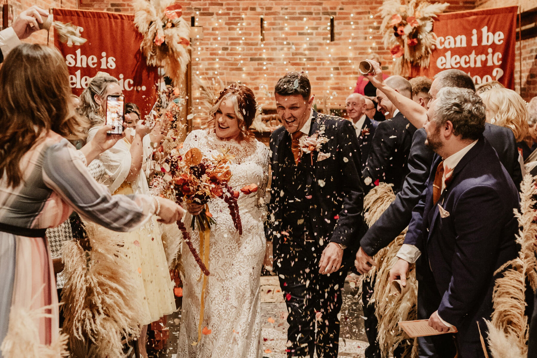 Confetti wedding ceremony exit, colourful, bohemian. Donington Park Farmhouse Wedding