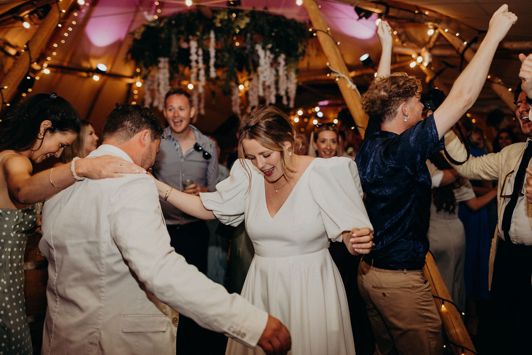 Bride on the dance floor in a tipi