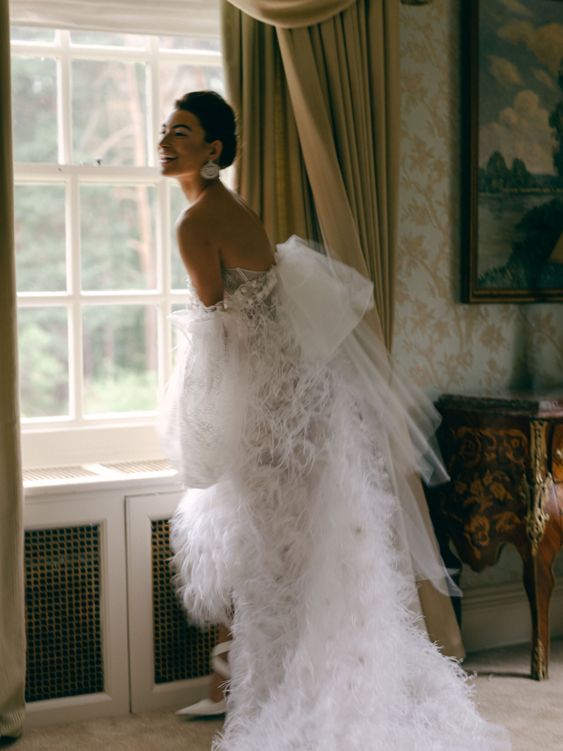 Sally Bean Couture wedding dress with ostrich feathers. Bridal muse by Katie Julia Photography.