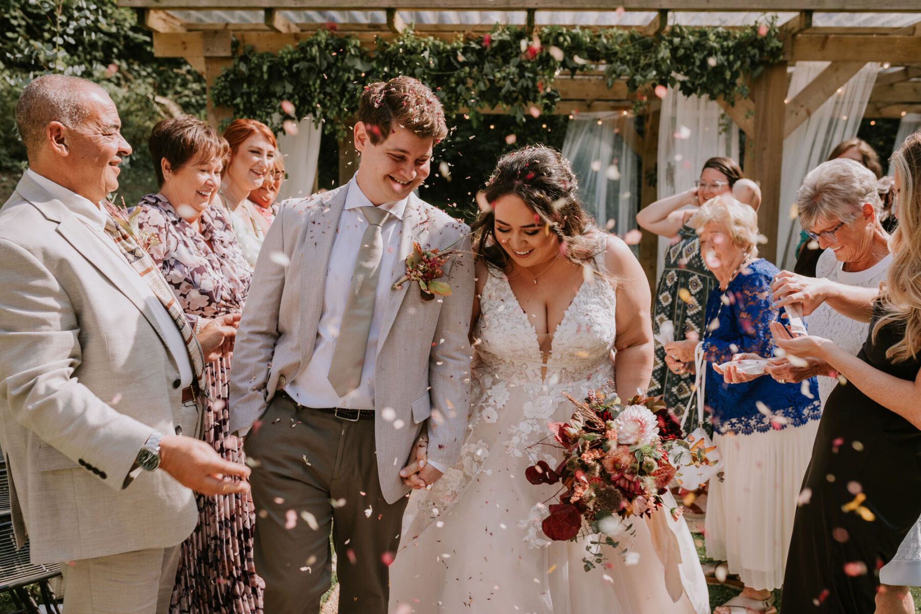 Wedding at Larpool Mill, Whitby. Couple showered in confetti.