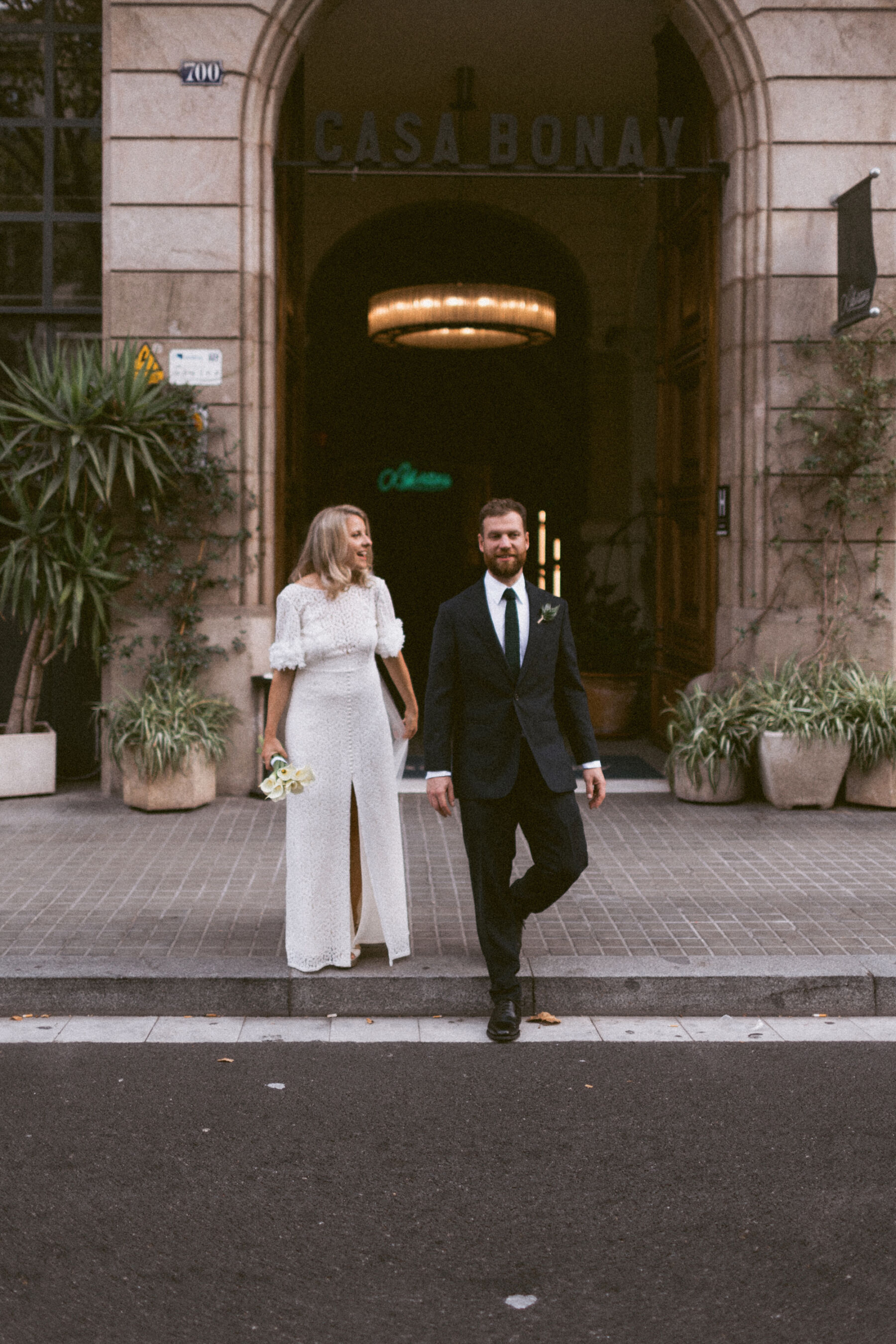 Bride in Immacle wedding dress. Modern groom in Caseley Hayford wedding suit. Rebecca Rees Photography.