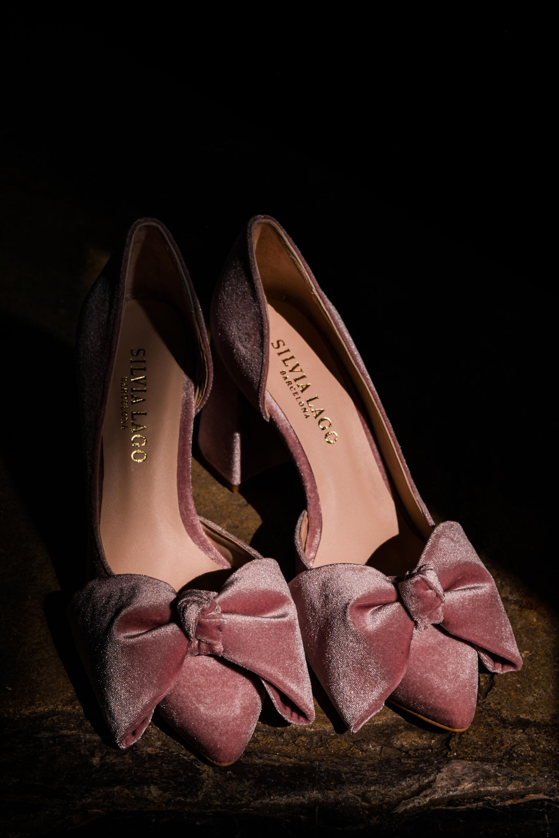 Pink velvet shoes with a bow