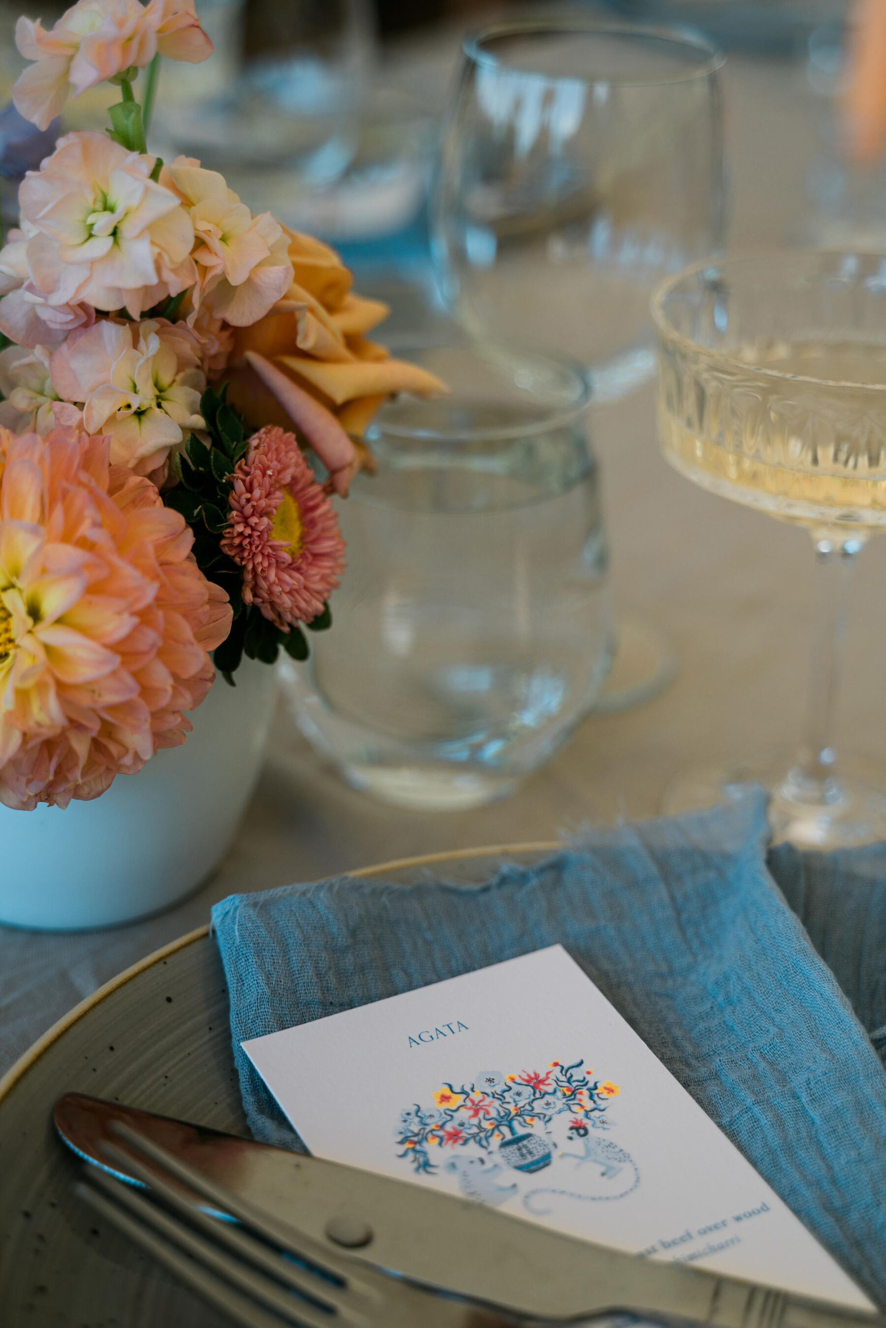 Summer wedding flowers and pale blue table decor