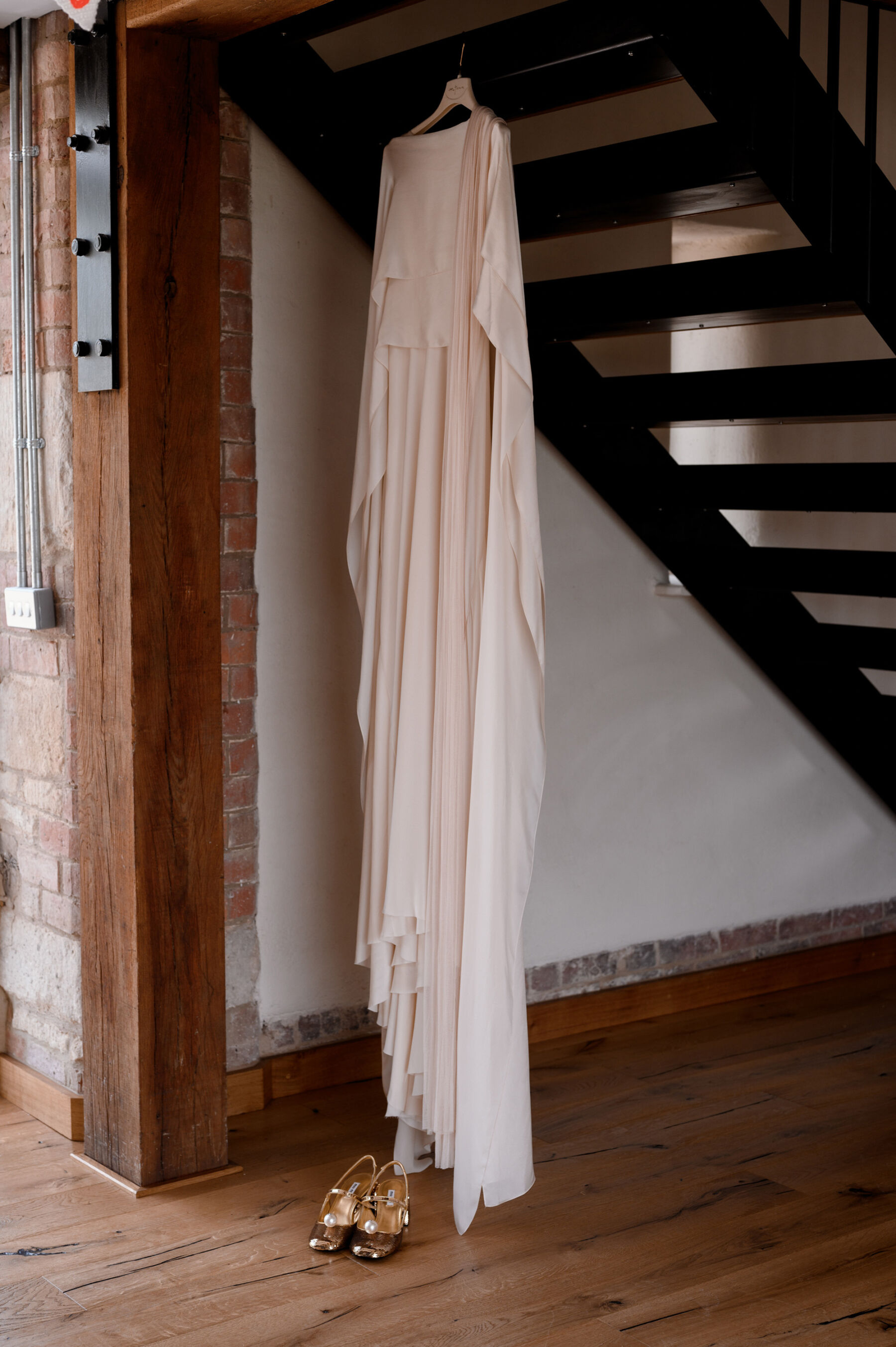 Katie in Cortana for her Colourful & Joyful Wedding on the Family Farm 5 Cortana wedding dress and Miu Miu sequin wedding shoes. Taylor Hughes Photography.