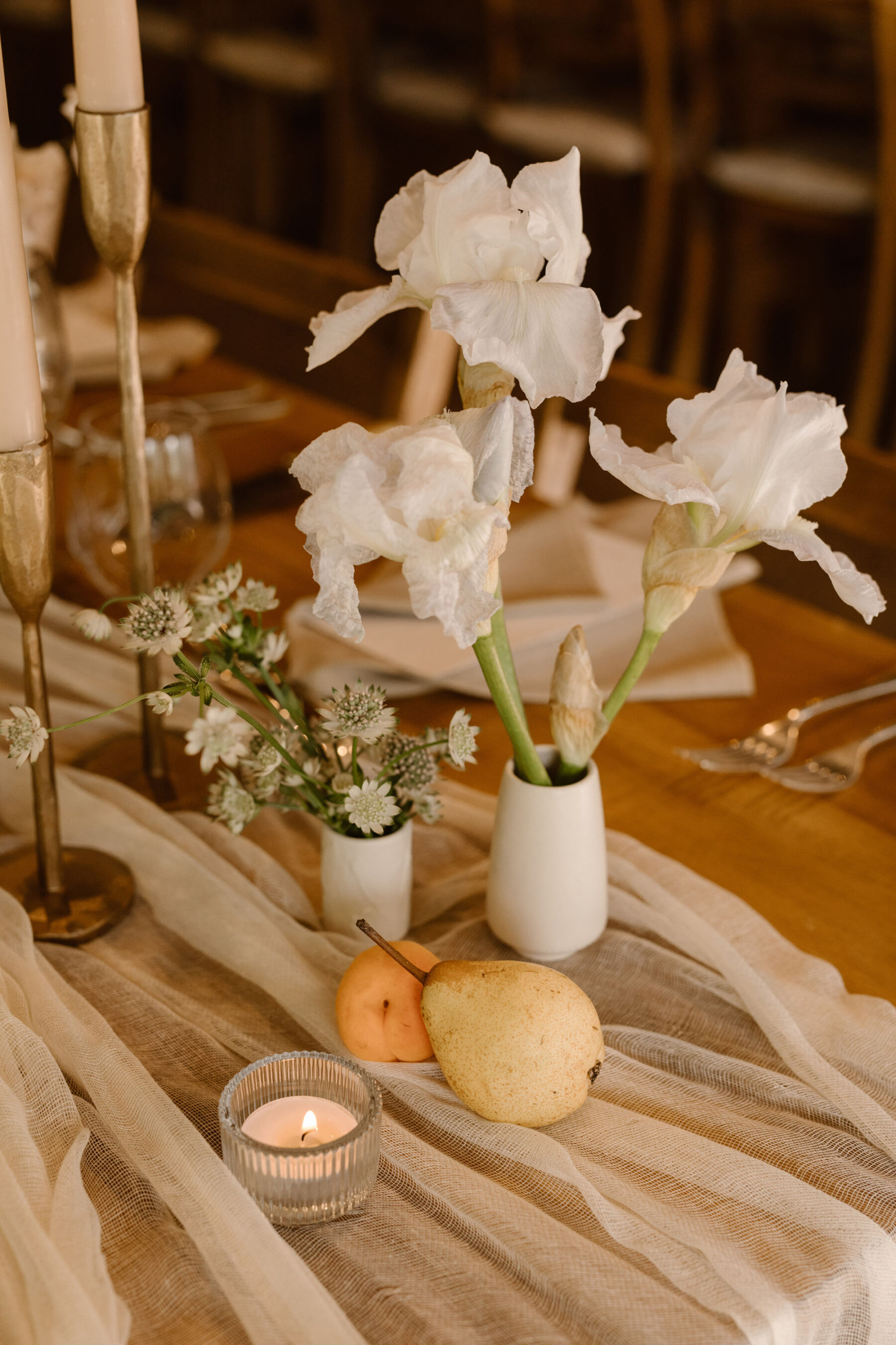 A Look Inside Dewsall Court Country House, A Family Run Wedding Venue in Herefordshire 29 Simple wedding flowers and fruit as wedding table decor. Agnes Black Photography.