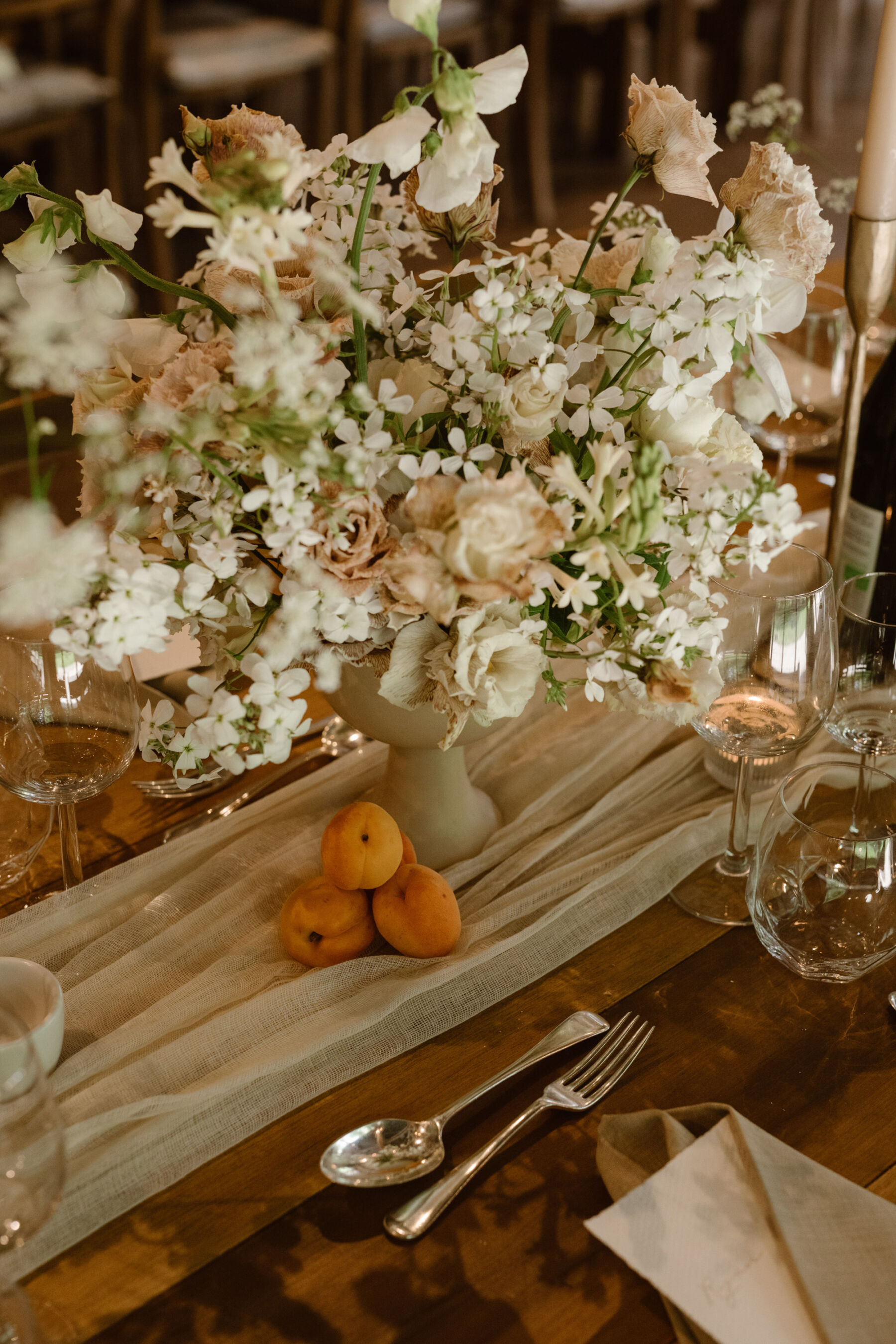 A Look Inside Dewsall Court Country House, A Family Run Wedding Venue in Herefordshire 32 Pastel wedding table flowers. Agnes Black Photography.