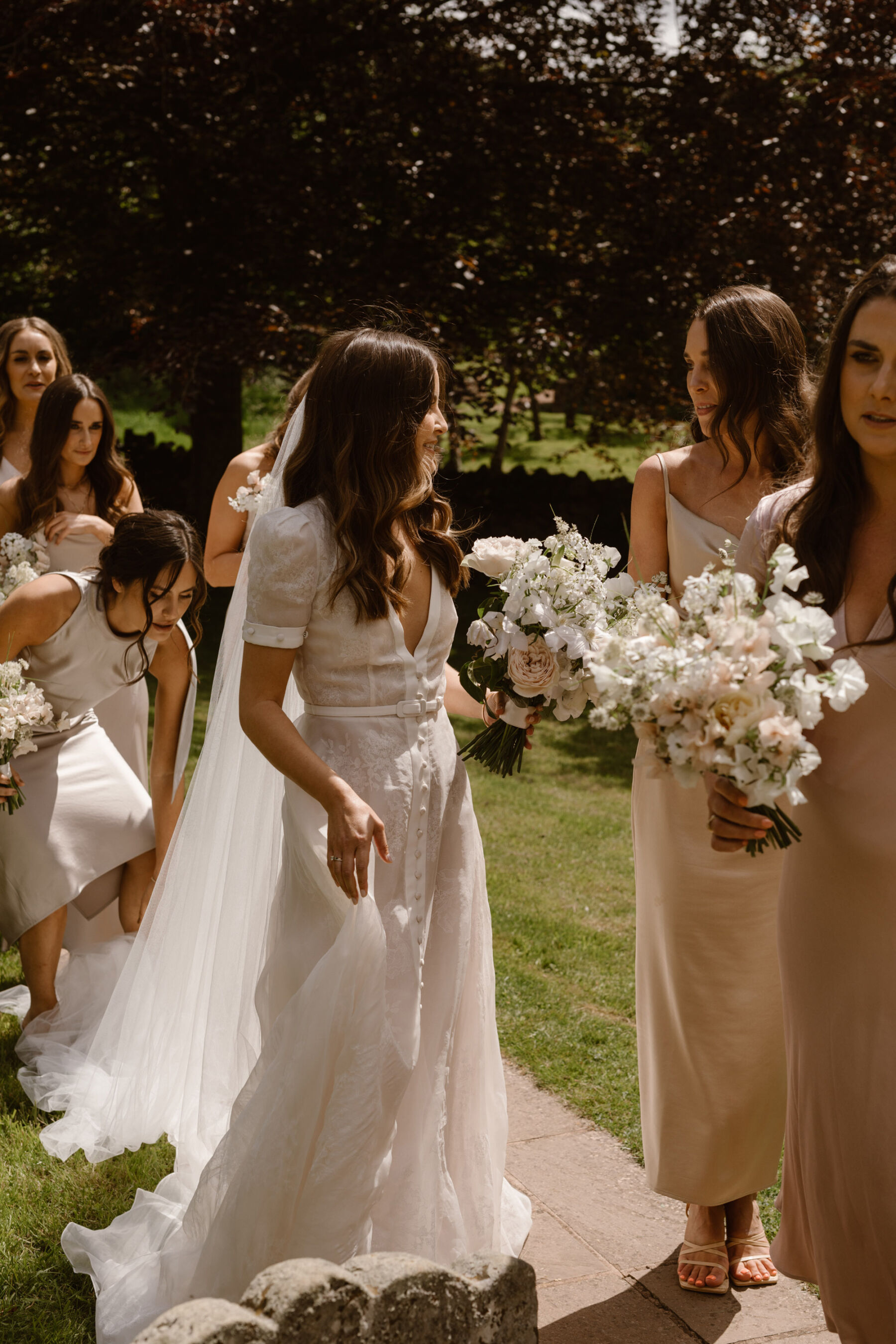 Bride wearing J Andreatta wedding dress from Amare. Agnes Black Photography.