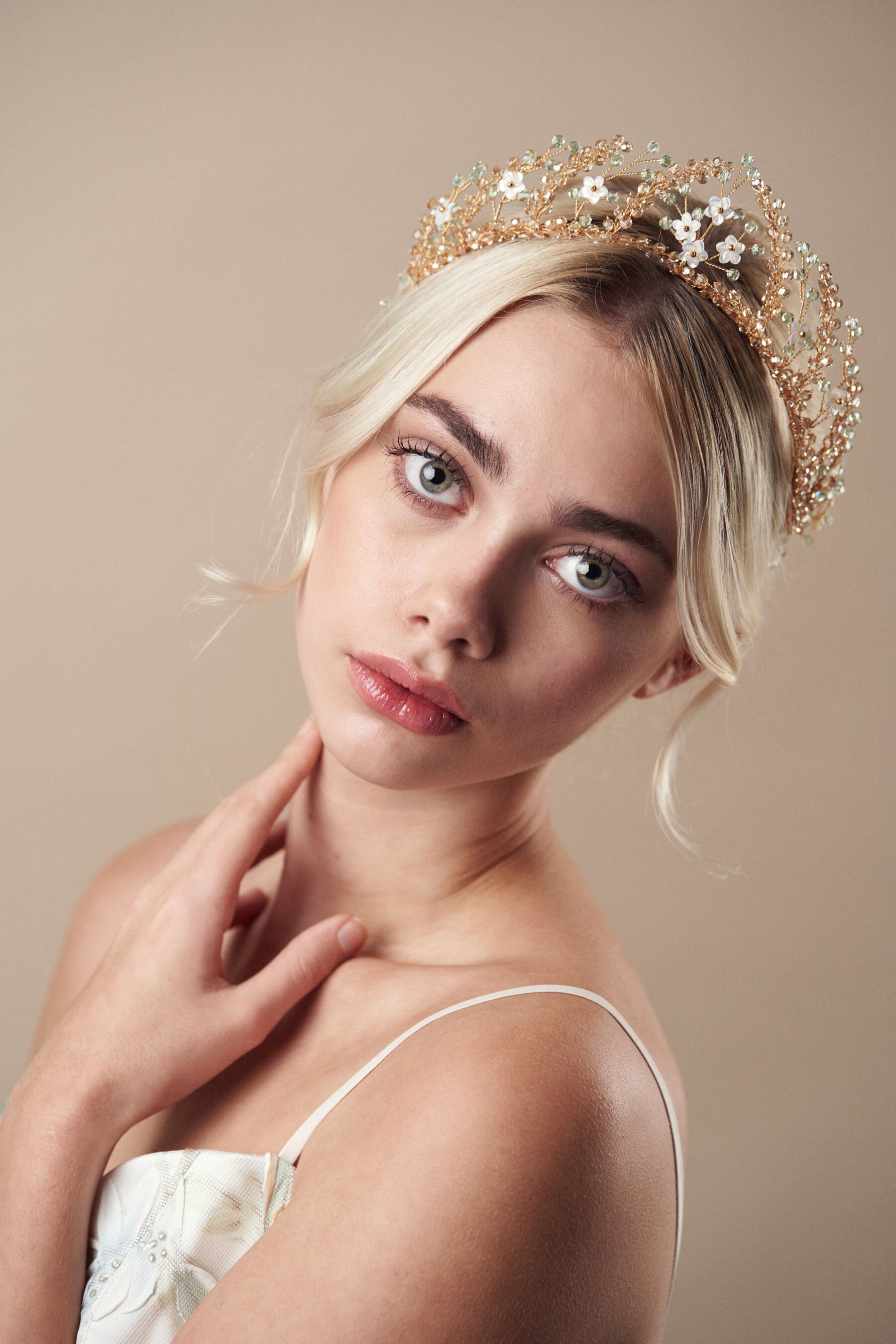 Green and gold wedding crown in crystal with mother of pearl flowers by Debbie Carlisle