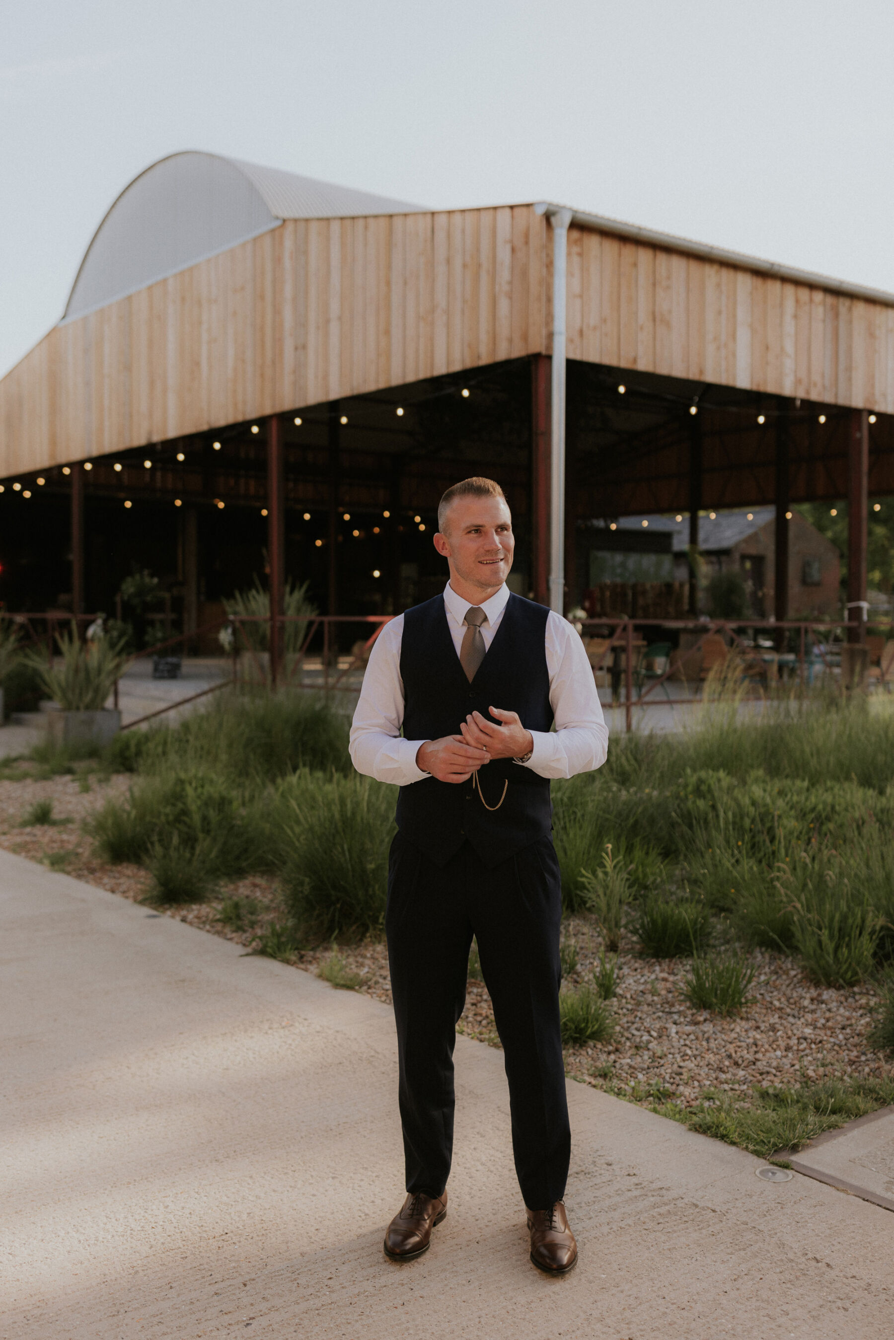 Groom in 3 piece suit from Edit Suits.