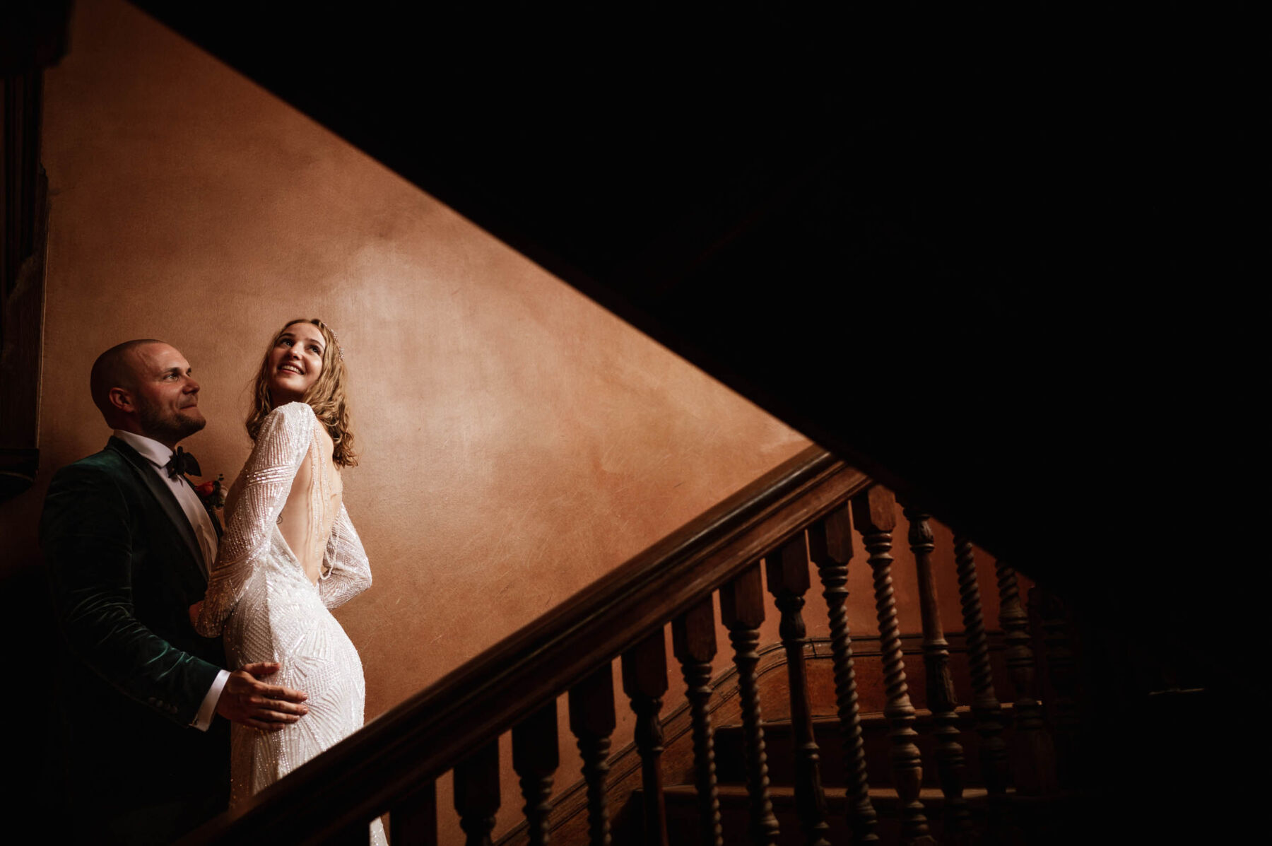 Bride in backless sequin wedding dress by Eliza Jane Howell. Groom in velvet green tuxedo. Robin Goodlad Photography.