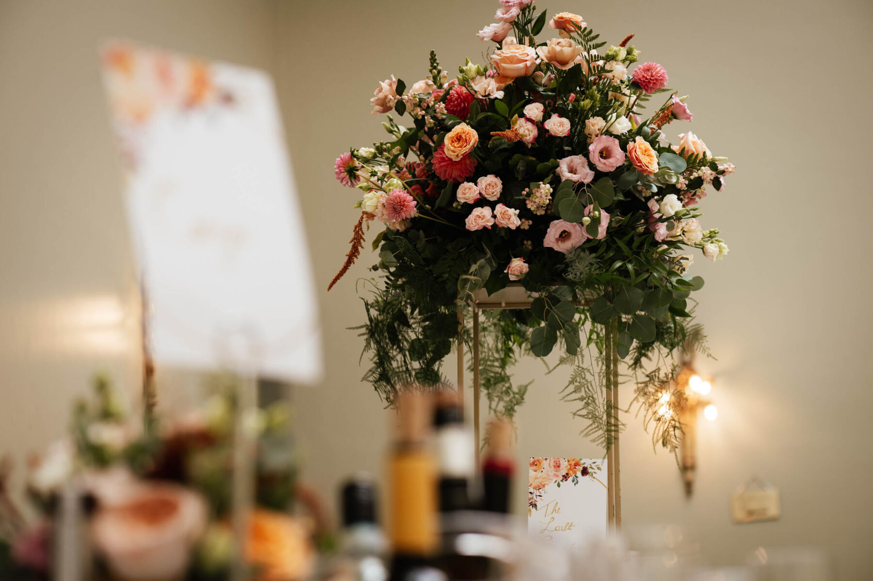 Raised tableflowers in pinks and oranges. 